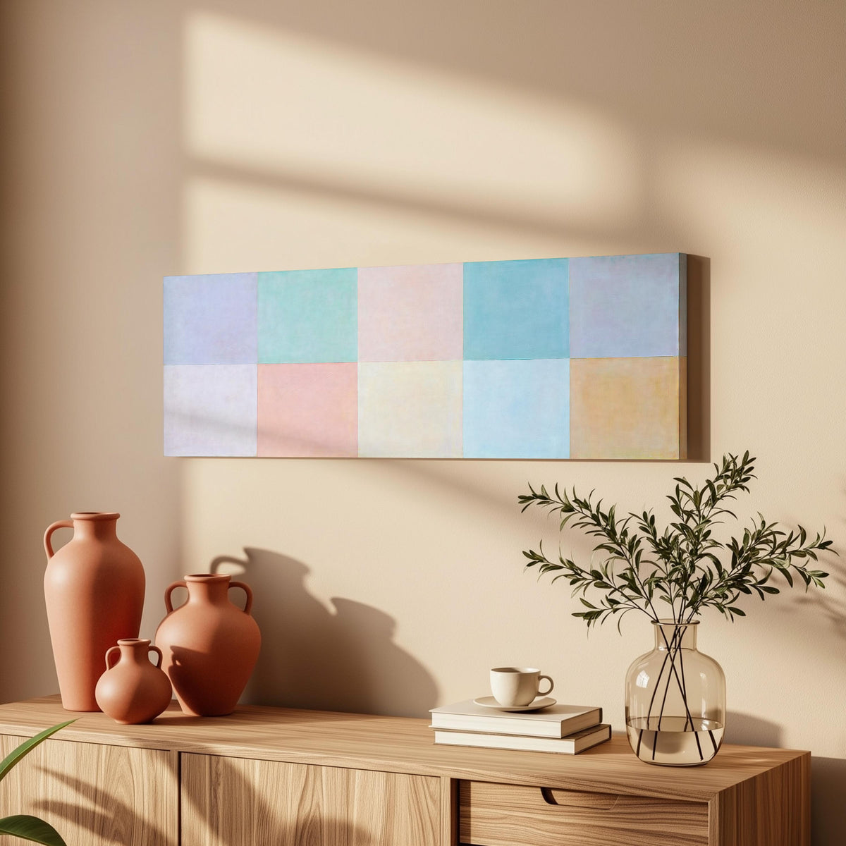 Pastel checkerboard grid long horizontal canvas print above a wooden sideboard
