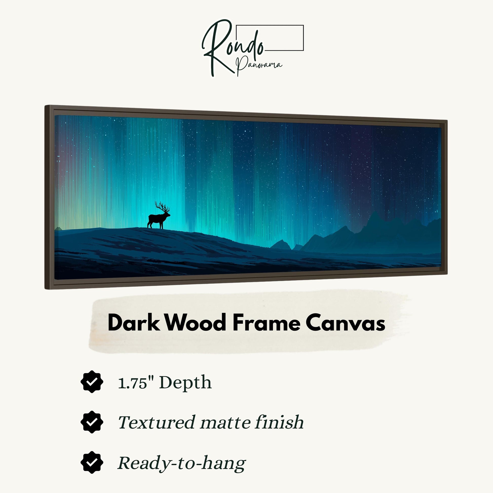 a dark wood frame canvas depicting a silhouetted deer standing on a hill against a night sky with a vibrant display of the northern lights.