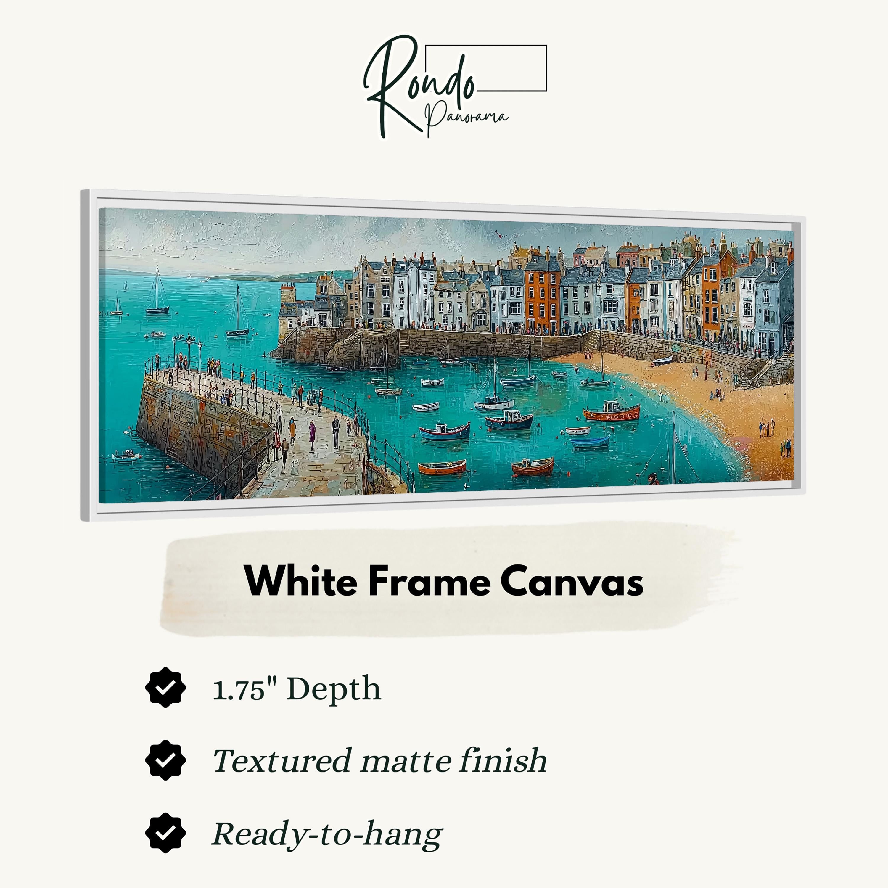 The image is a white frame canvas depicting a coastal town with boats on the water and people walking along the beach.