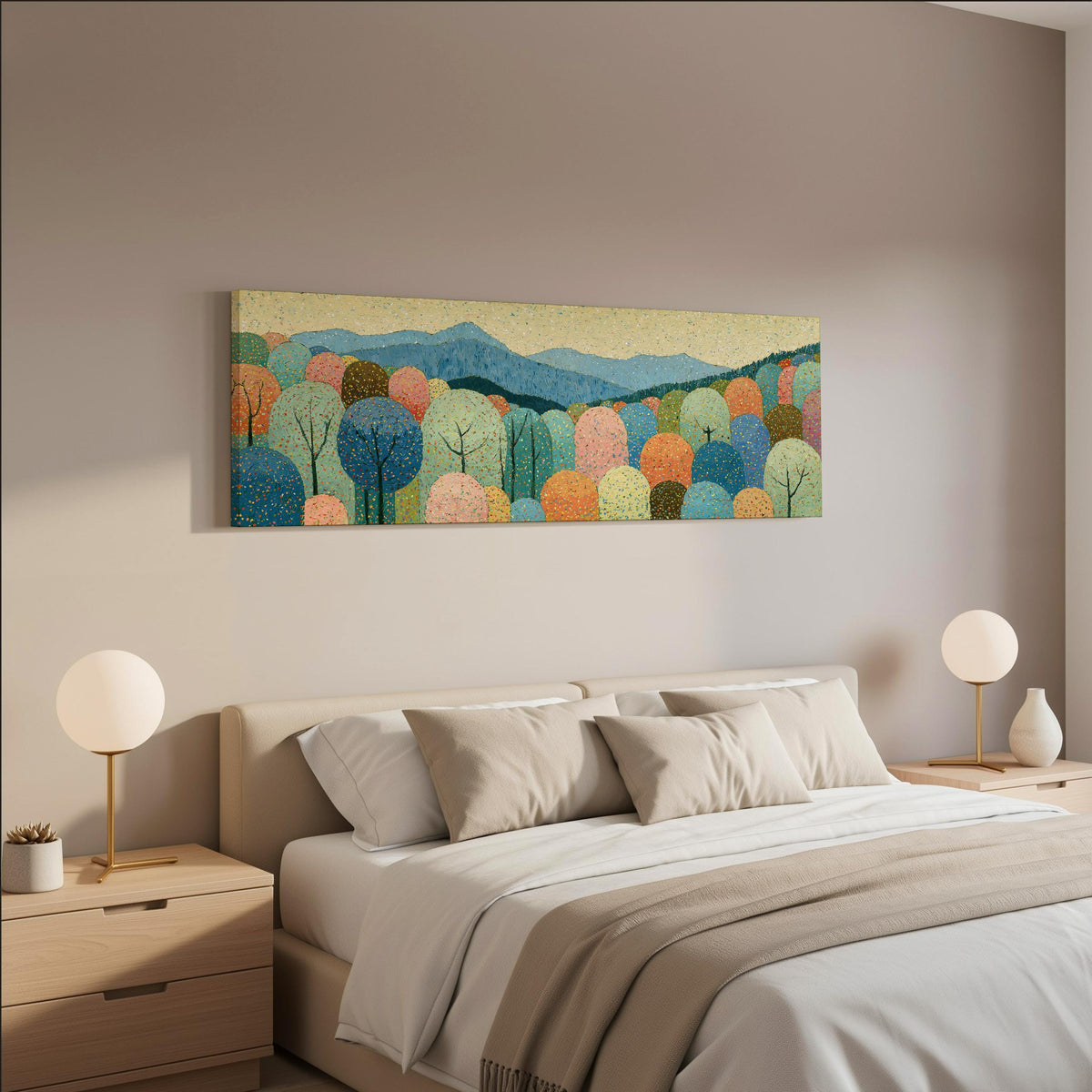 Pastel dotted forest below blue mountains wide panoramic canvas print above a bed in a neutral bedroom