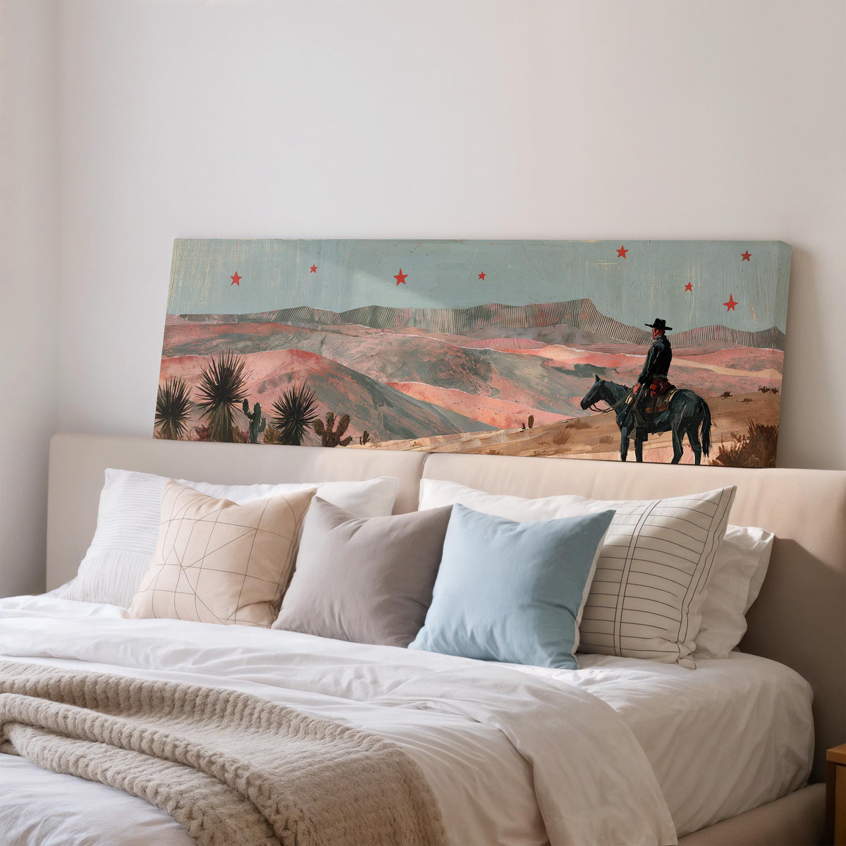 Desert cowboy under red stars wide panoramic canvas print above a bed in a bedroom