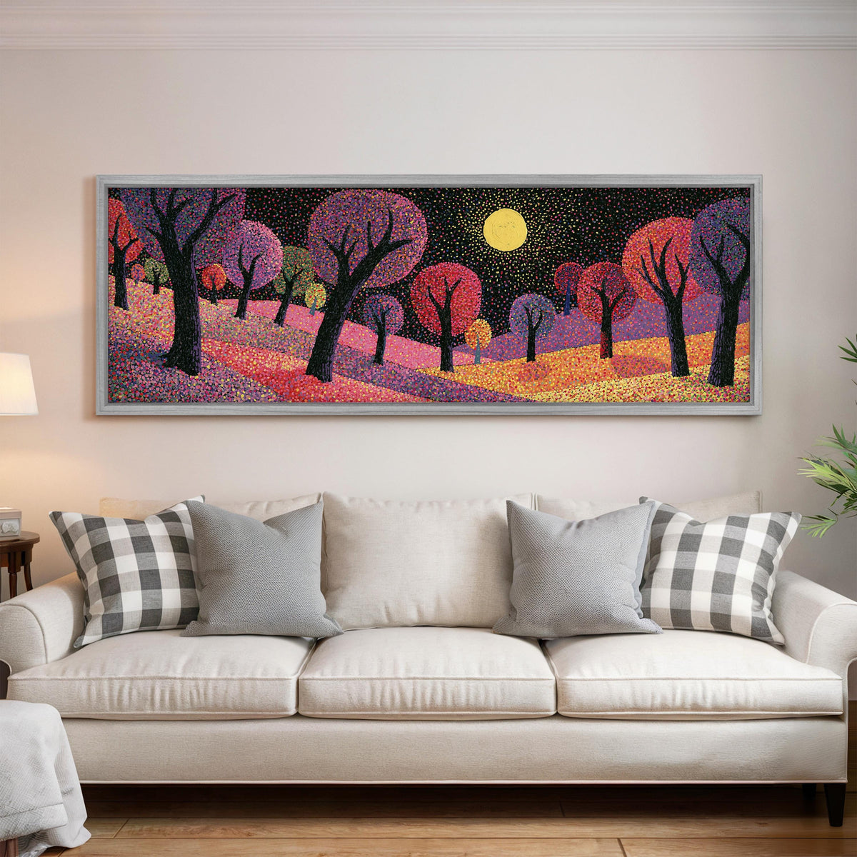 Purple dusk forest under the moon panoramic canvas print above a white sofa in a bright living room