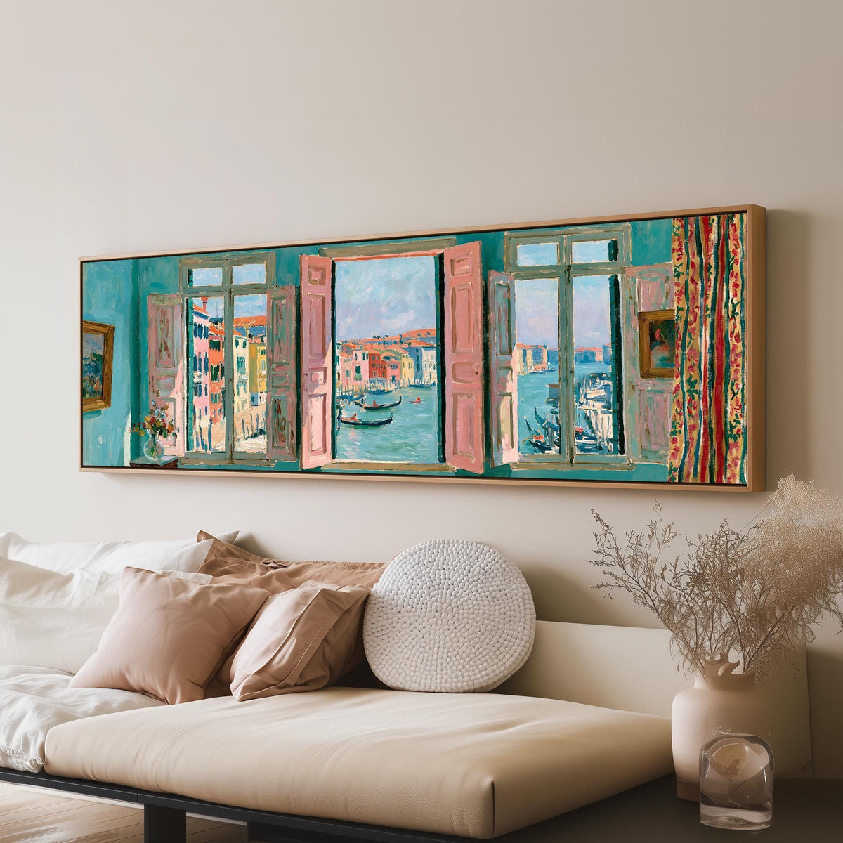 Venice canal and gondolas through a window long horizontal canvas print above a sofa in a living room
