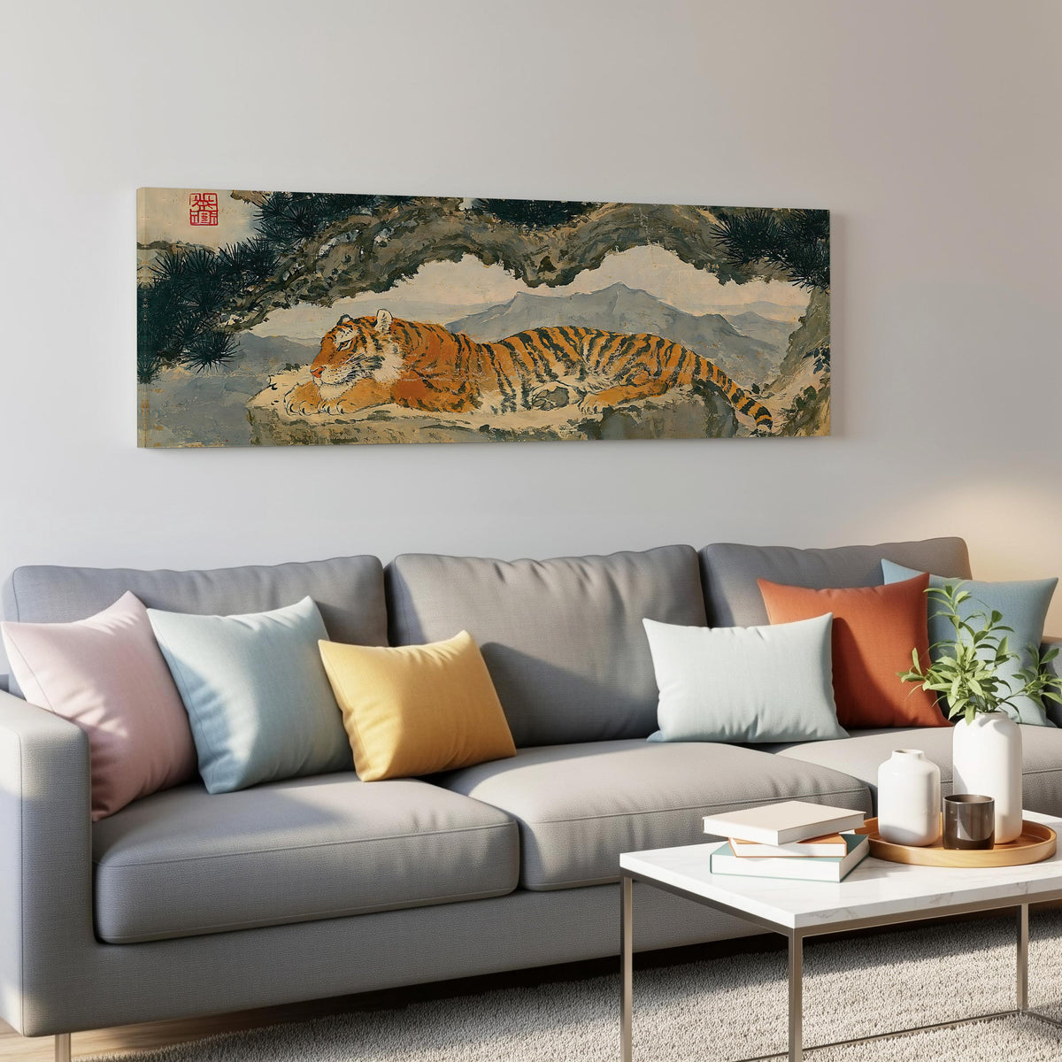 Tiger resting beneath misty pines panoramic canvas print above a grey sofa in a living room