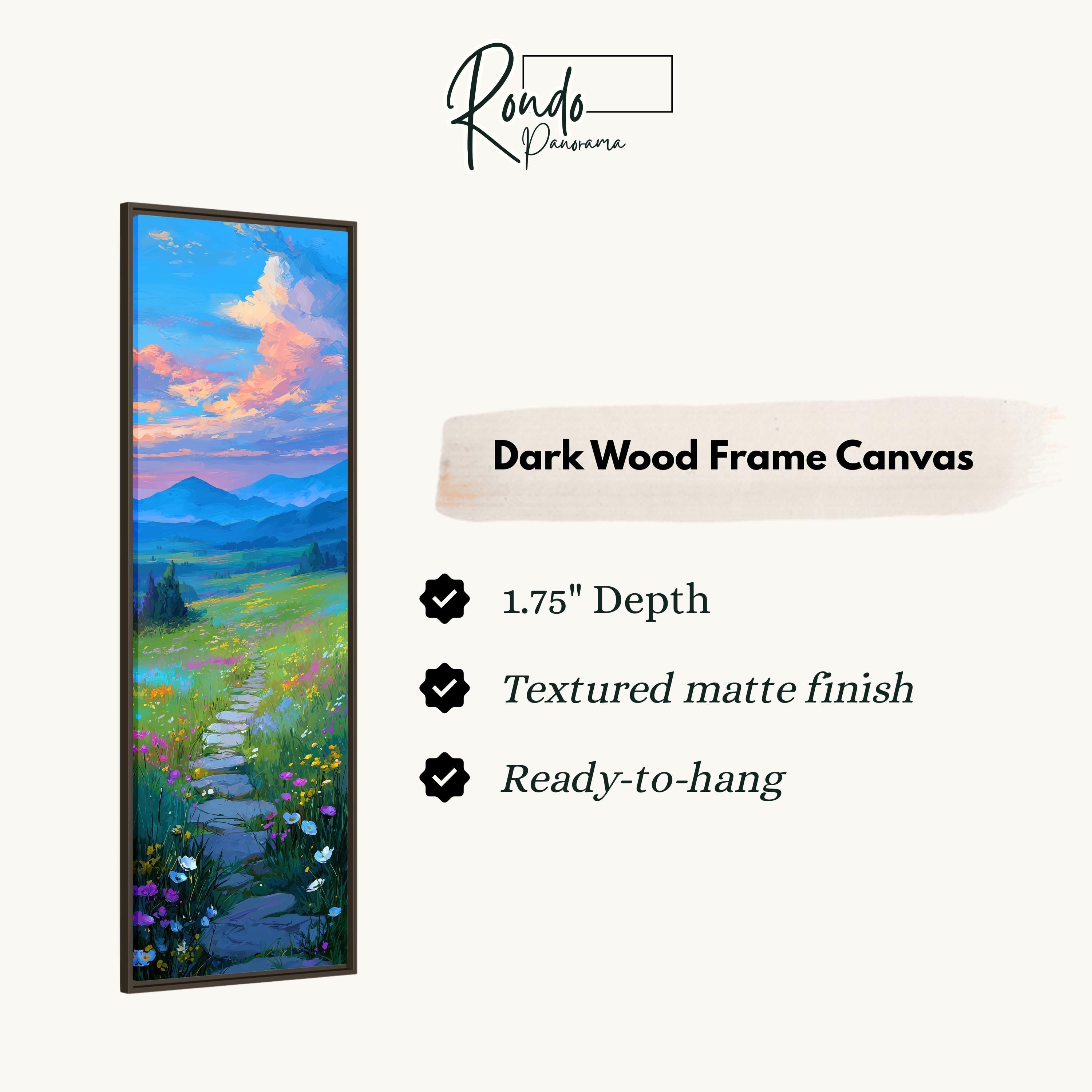 The image is a rectangular dark wood frame canvas depicting a scenic landscape with a winding path leading through a field of flowers and mountains.