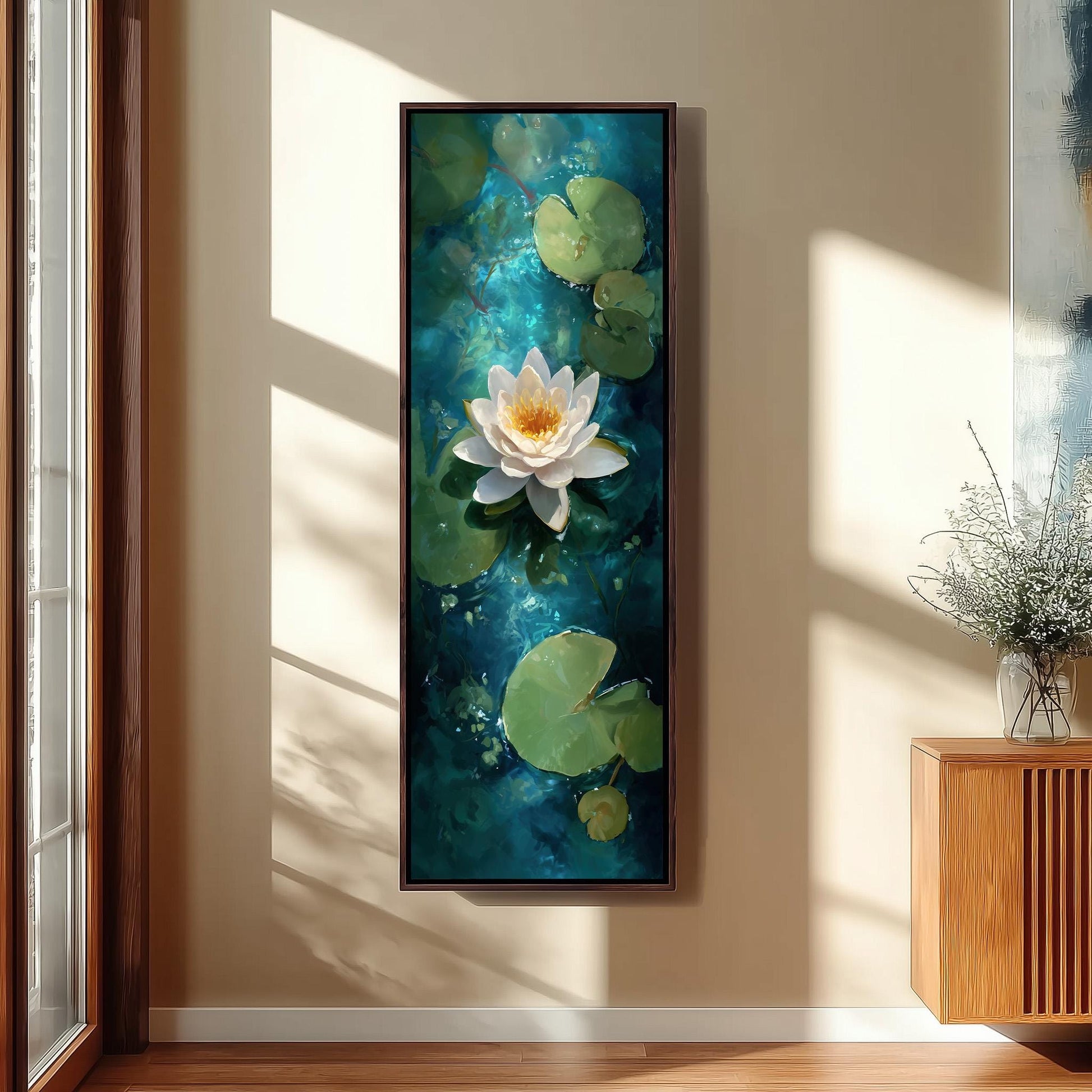 a large framed painting of a white lotus flower surrounded by green lily pads hanging on a wall.