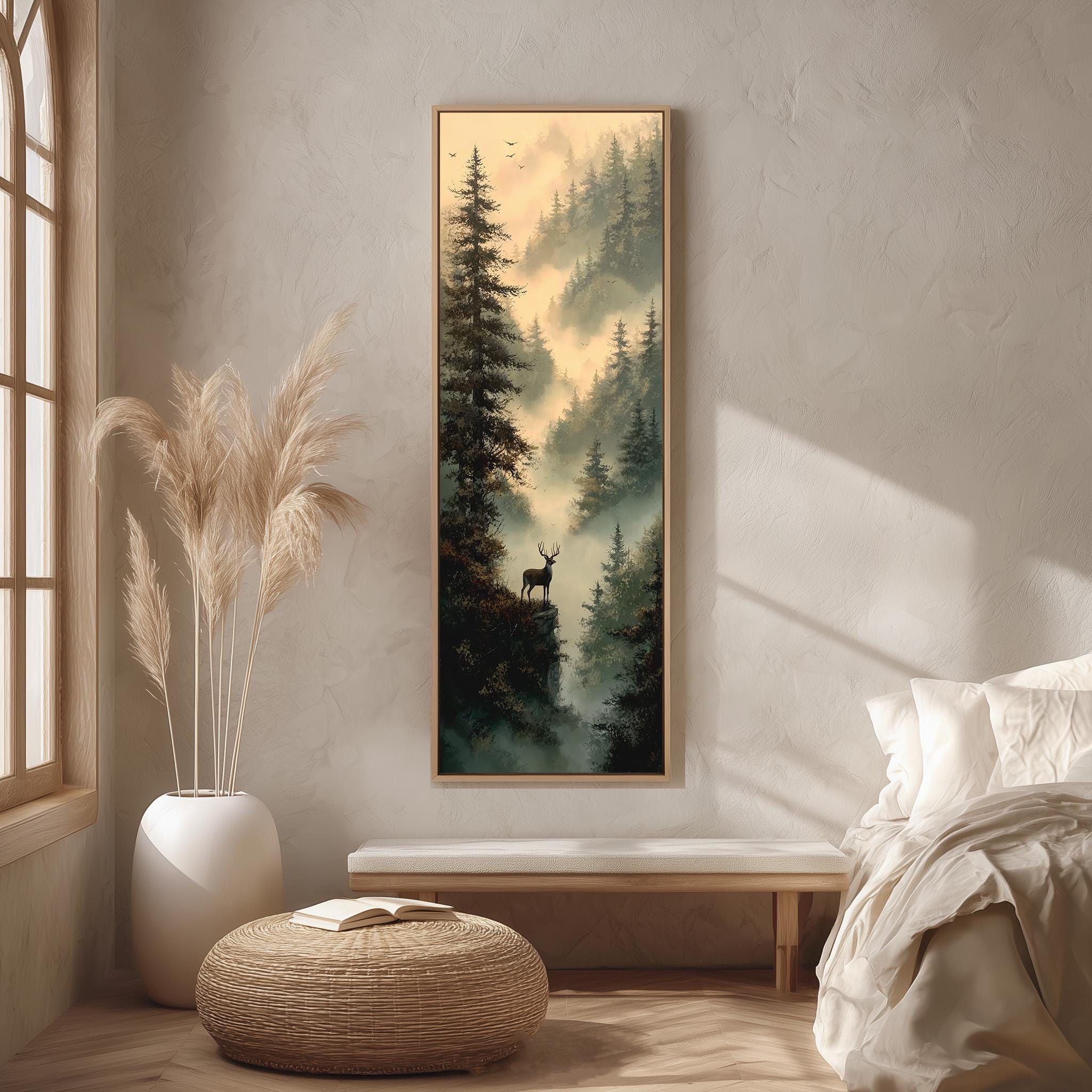 a serene indoor setting with a large painting of a forest scene hanging on the wall. The painting depicts a deer standing on a cliff overlooking a misty forest. The room has a minimalist design, with a bed, a bench, and a potted plant in the foreground. The overall atmosphere of the room is calm and peaceful, with the painting serving as a focal point.