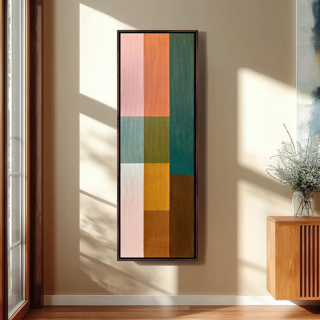 Pastel and earth tone color block grid long vertical canvas print in a sunlit living space
