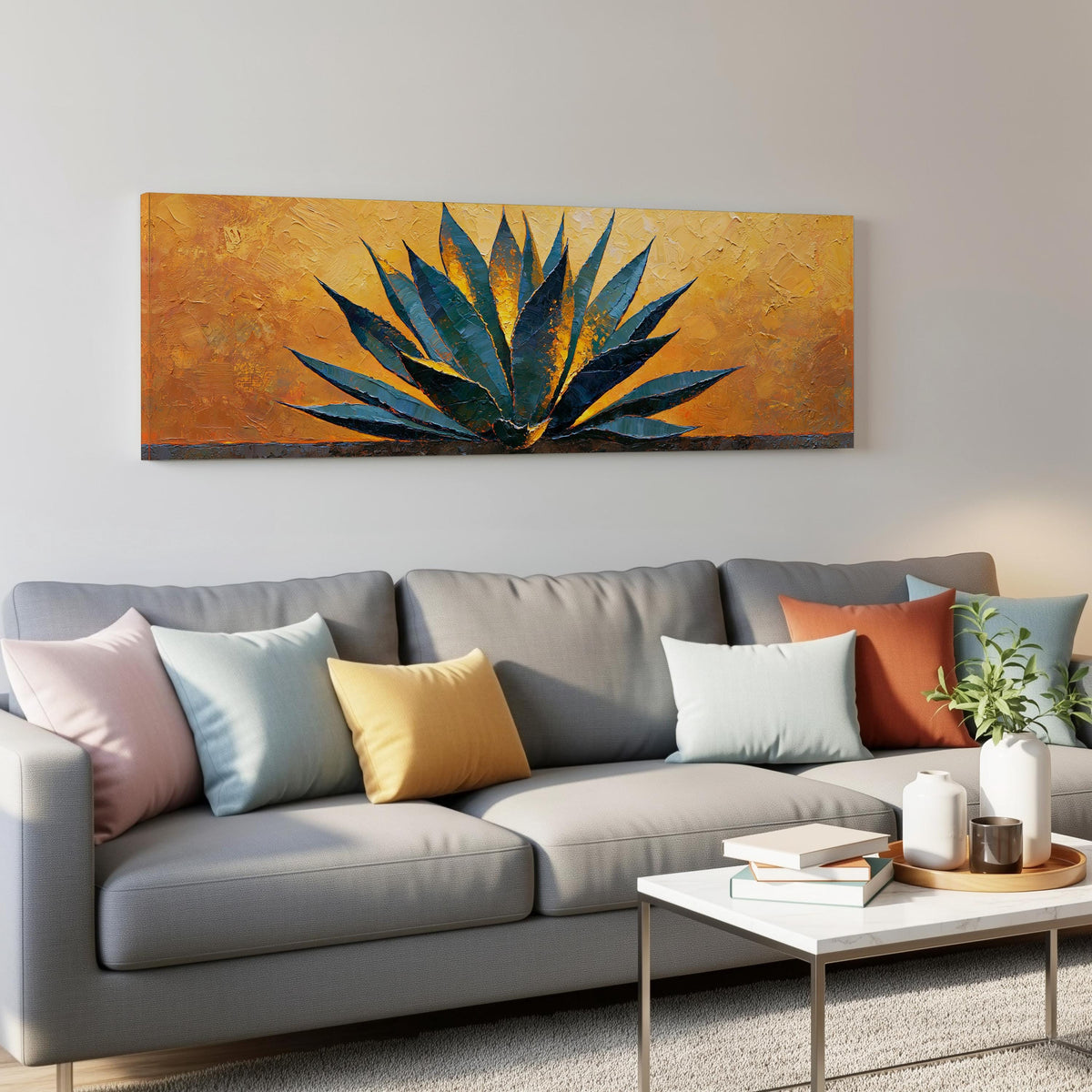 Blue agave on a textured gold background panoramic canvas print above a grey sofa in a living room
