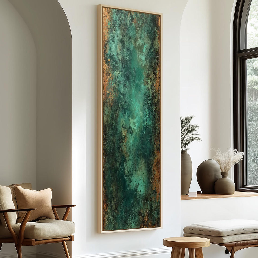 a modern living room with a large abstract painting hanging on the wall, a wooden chair, a small table, and a window with a plant on the sill.