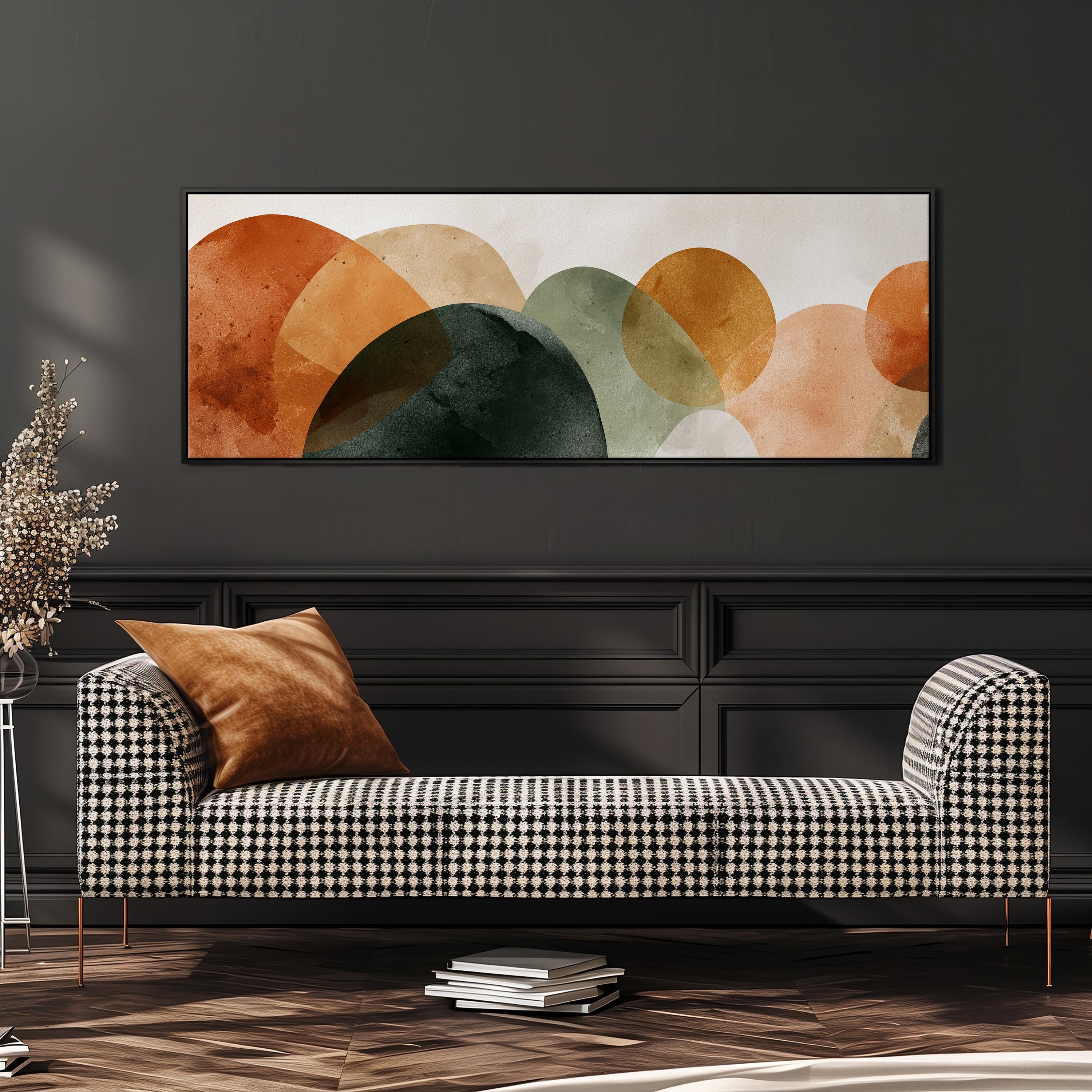 a modern living room with a black and white checkered sofa, a stack of books, and a large abstract painting hanging on the wall above the sofa.