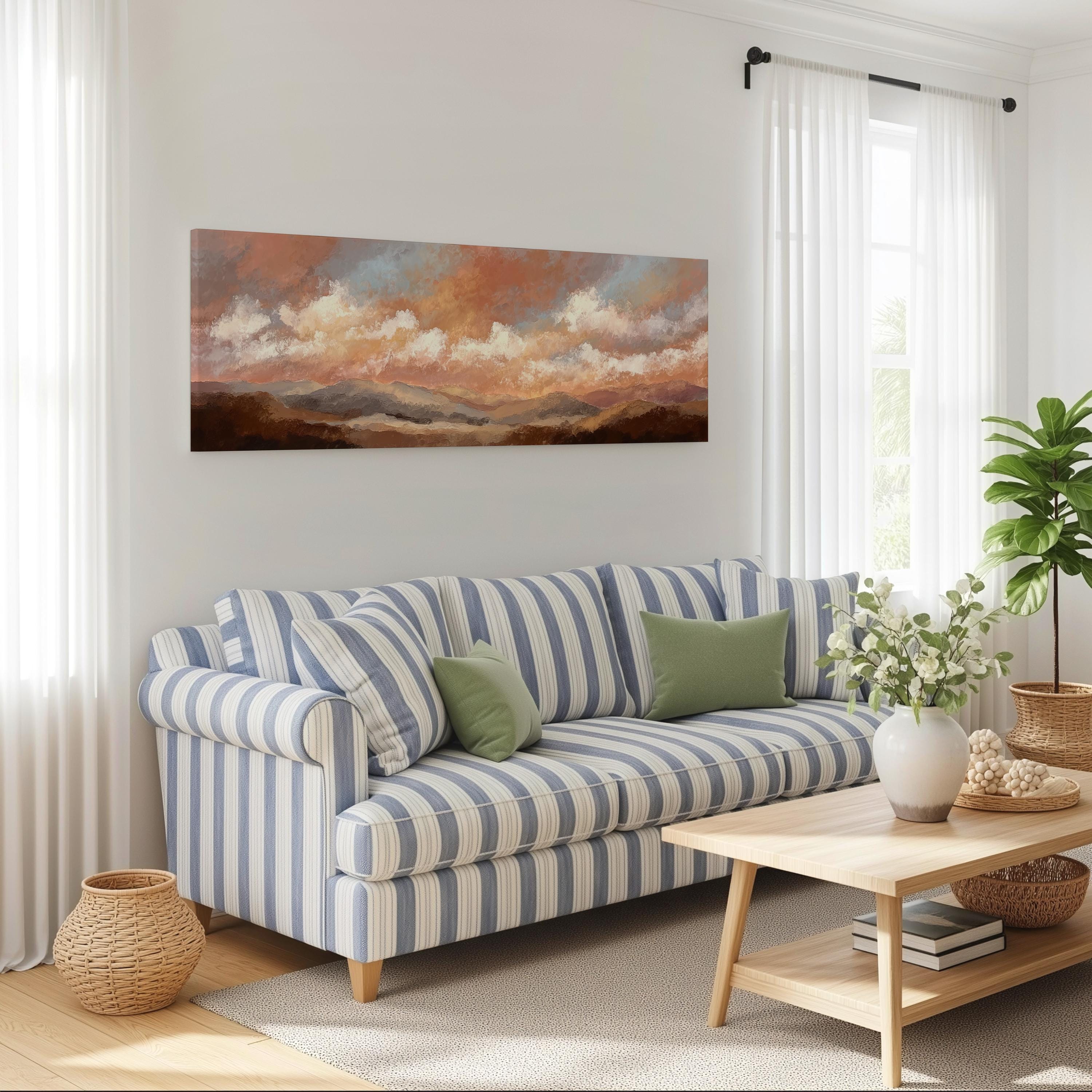 a cozy living room with a striped blue and white sofa, a wooden coffee table, and a large painting of a landscape hanging on the wall above the sofa.