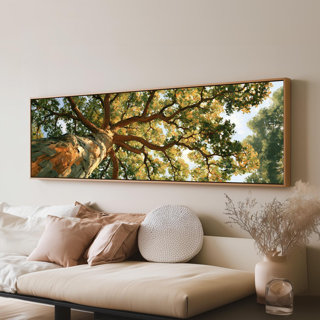 Autumn oak canopy seen from below long horizontal canvas print above a sofa in a living room