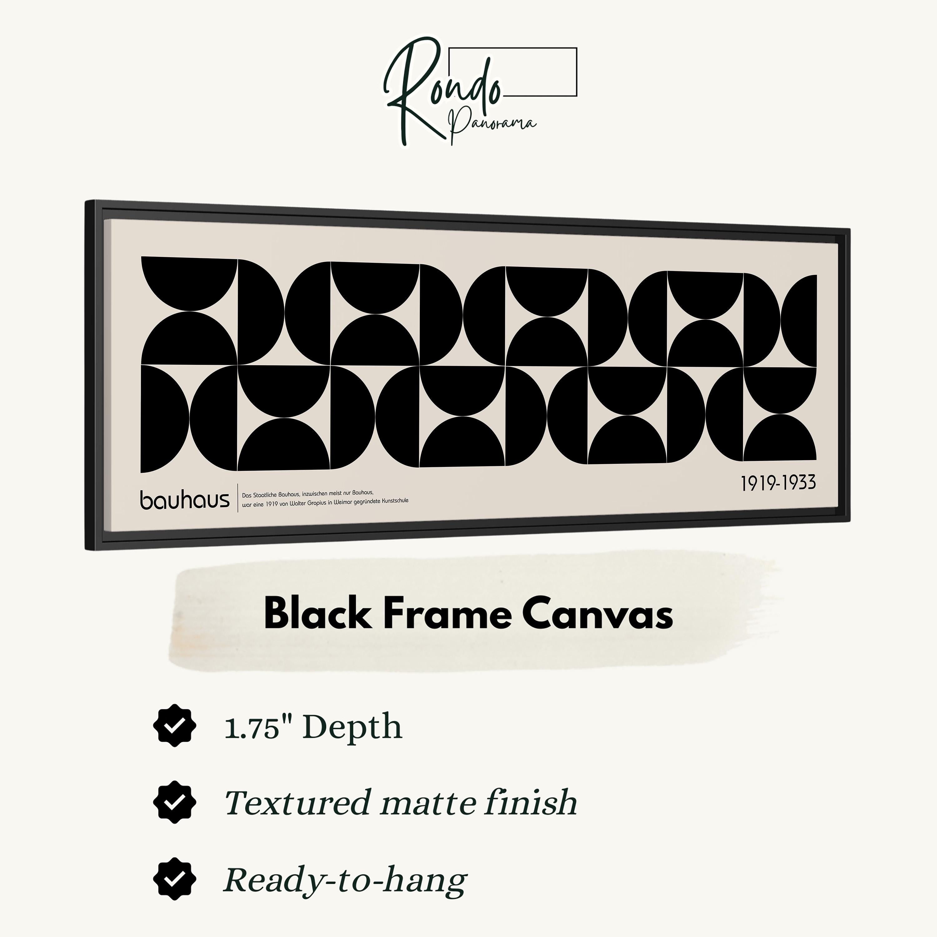 The image is a black and white photograph of a framed canvas with a geometric design.