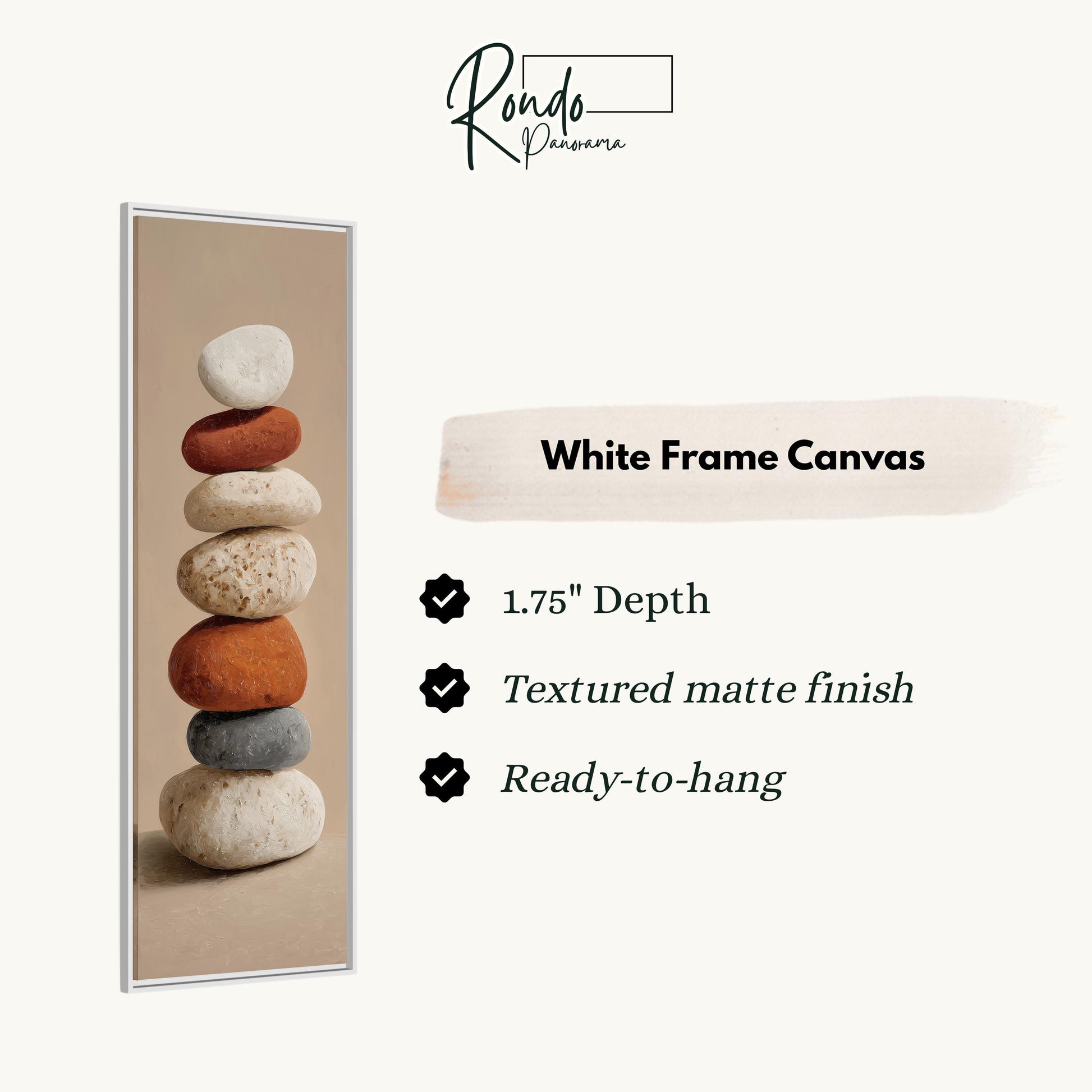 a white frame canvas with a stack of rocks on top of it.