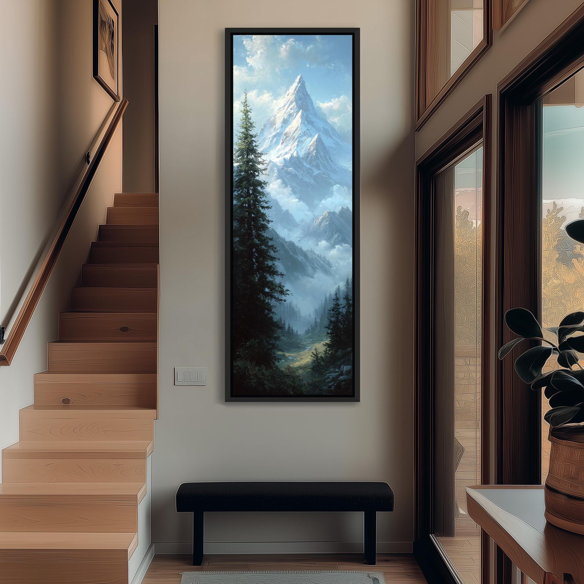 a large painting of a mountain landscape hanging on the wall of a room with wooden stairs and a bench.