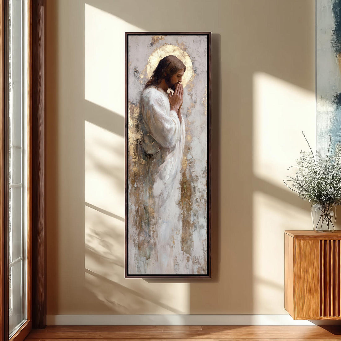 a large painting of Jesus Christ, hanging on a wall in a room with a bed, a potted plant, and a woven ottoman.