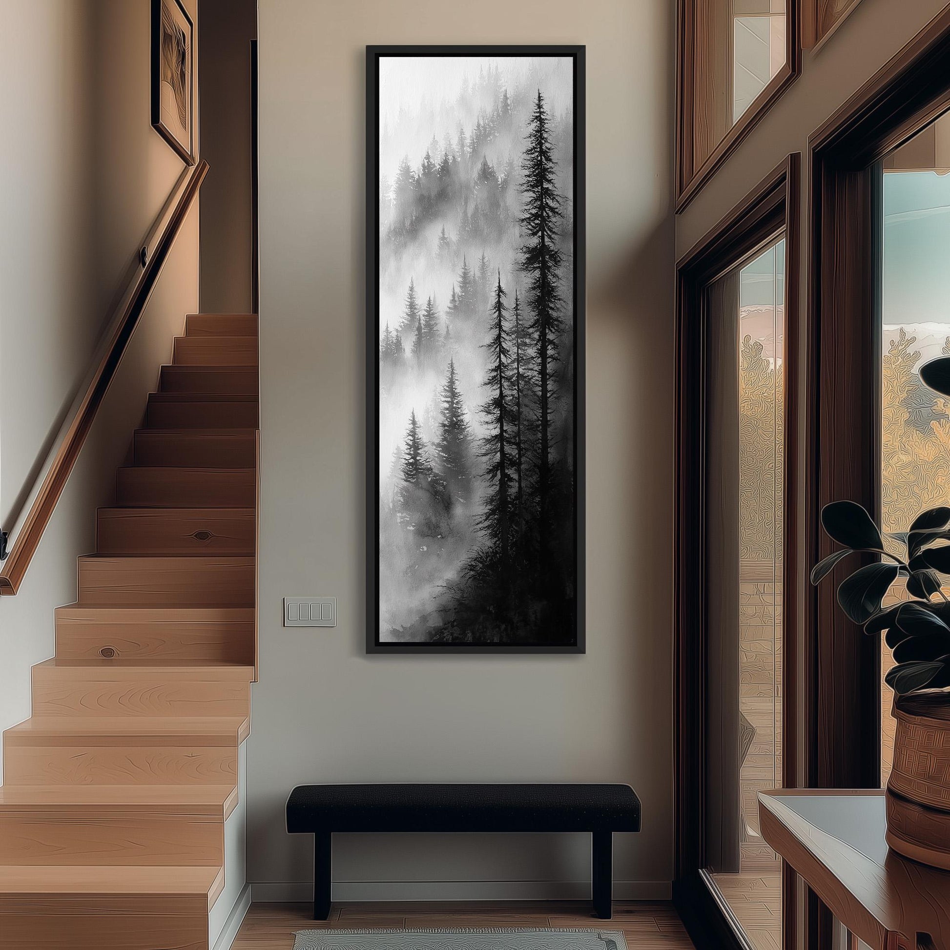 a hallway with a large black and white painting of a forest scene hanging on the wall. The painting depicts a misty forest with tall trees and a sense of depth and distance. The hallway has wooden stairs leading up to a door, and a bench is visible in the foreground.