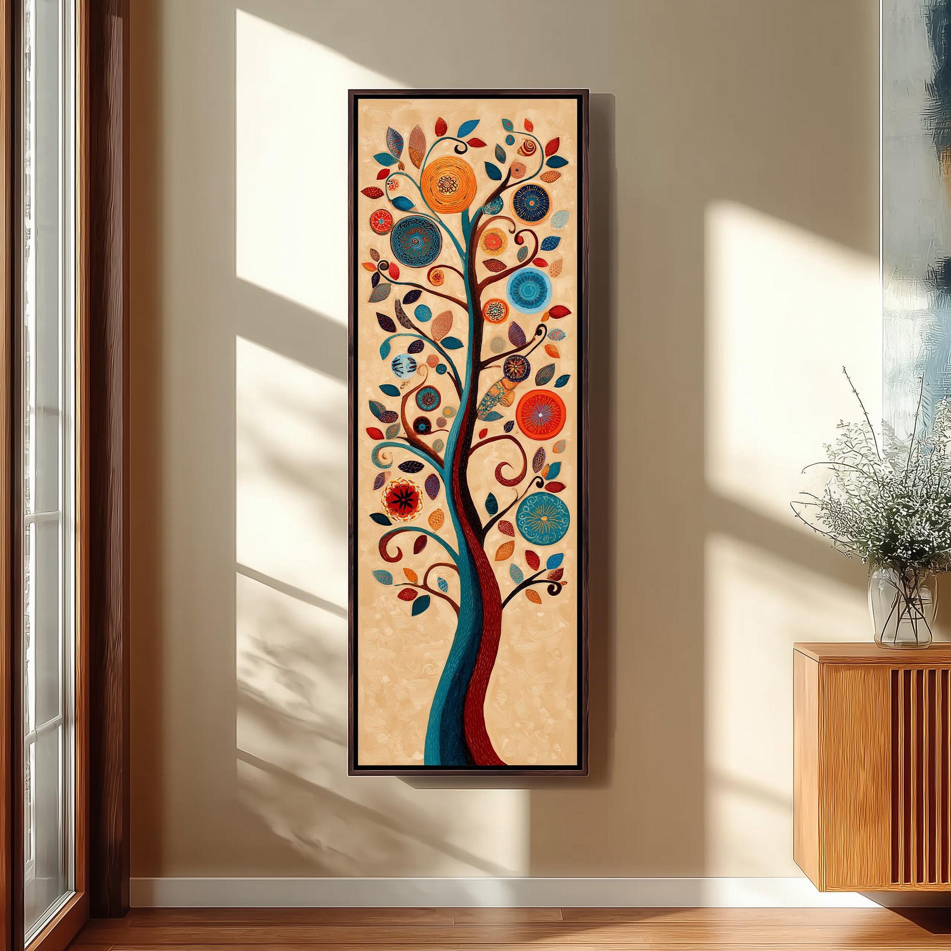 a large, colorful painting of a tree hanging on a wall in a room.