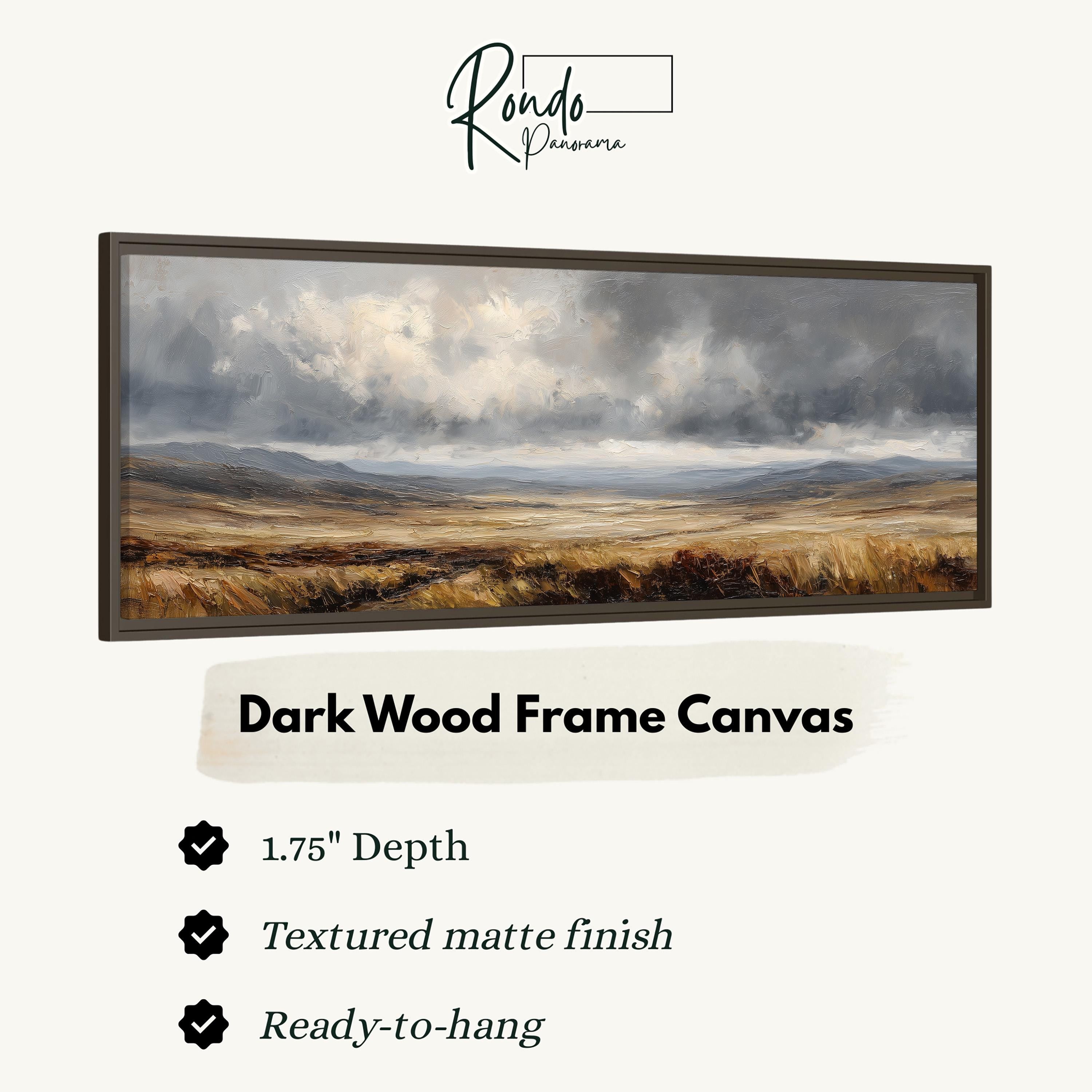 The image is a dark wood frame canvas depicting a landscape with a cloudy sky and a field of grass.