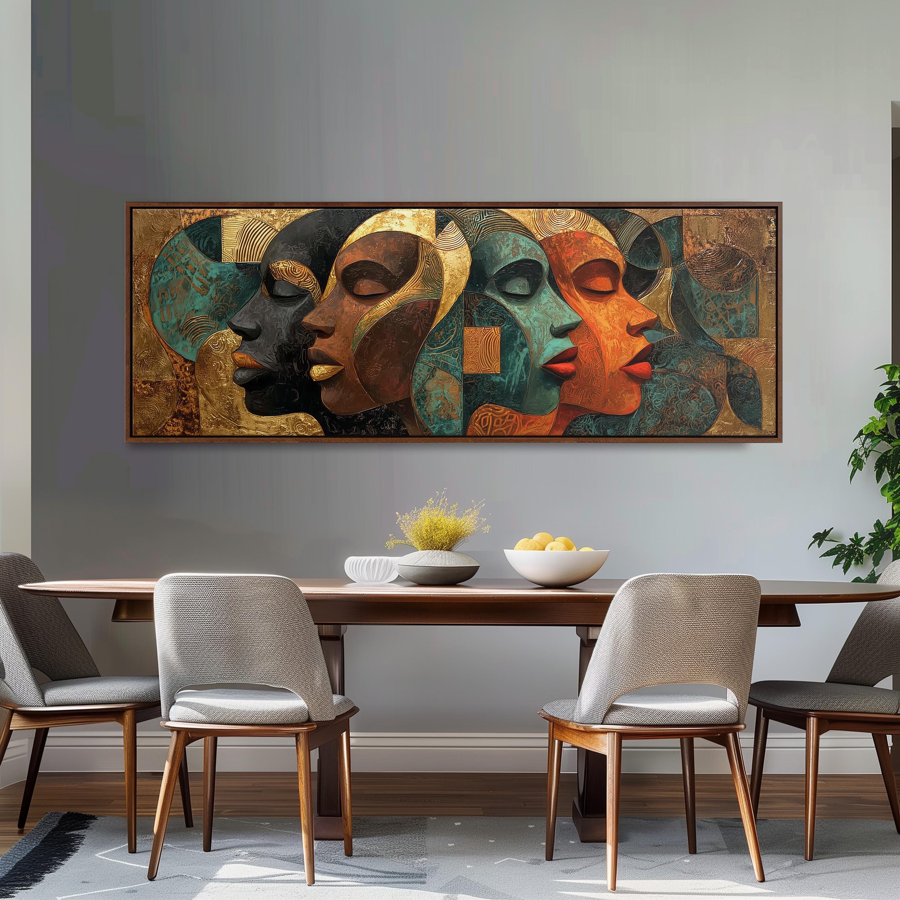 a large abstract painting of four colorful female faces displayed on a wall above a wooden dining table with four chairs.