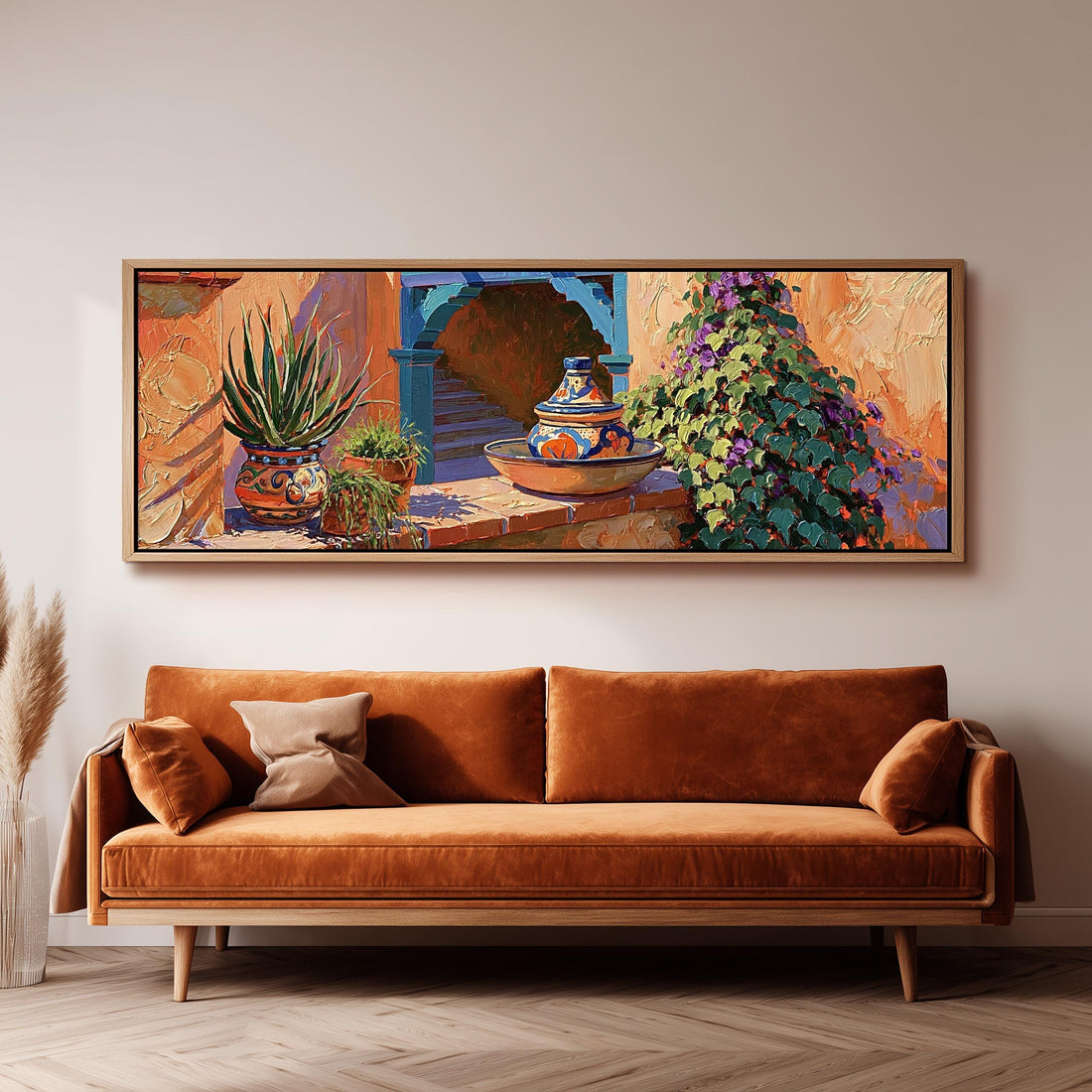 Courtyard corner with Talavera pottery and plants long horizontal canvas print above a sofa in a living room