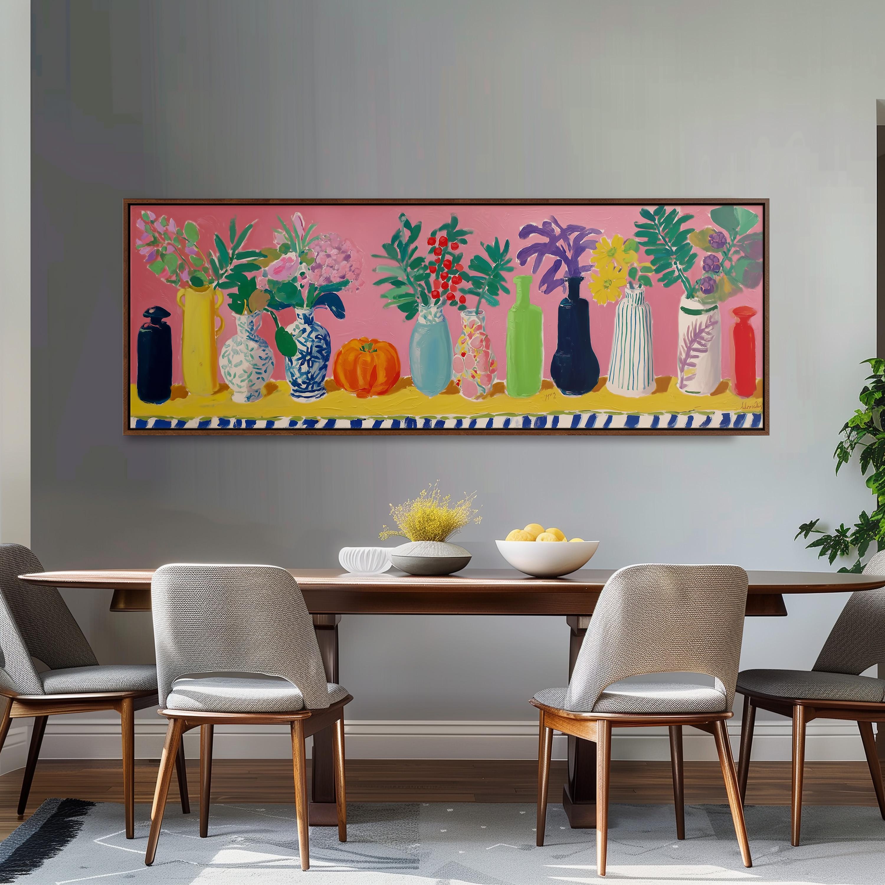 a dining room with a large painting of colorful vases and flowers hanging on the wall above a wooden dining table with four chairs.