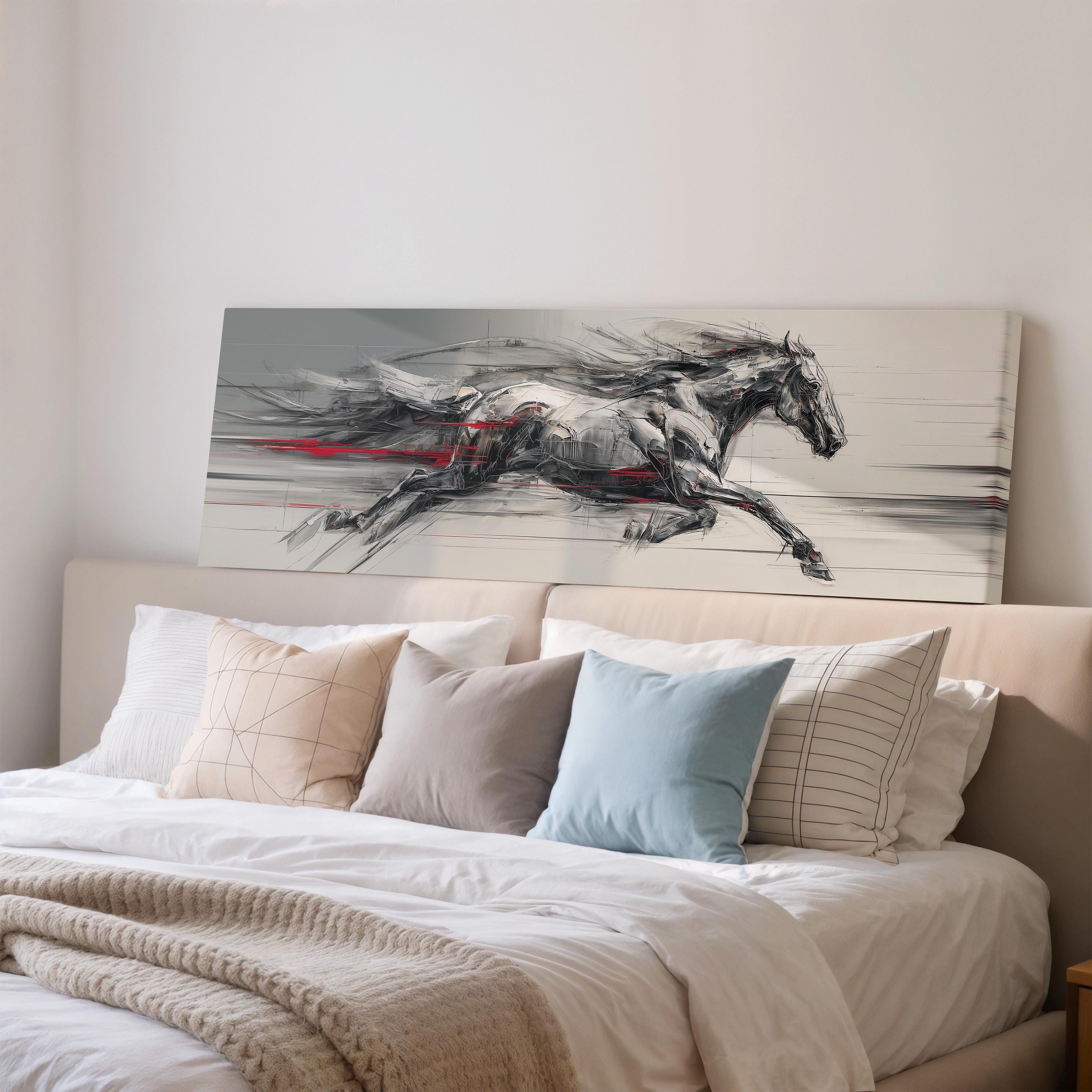 a large, white bed with a painting of a horse running on the headboard above it.