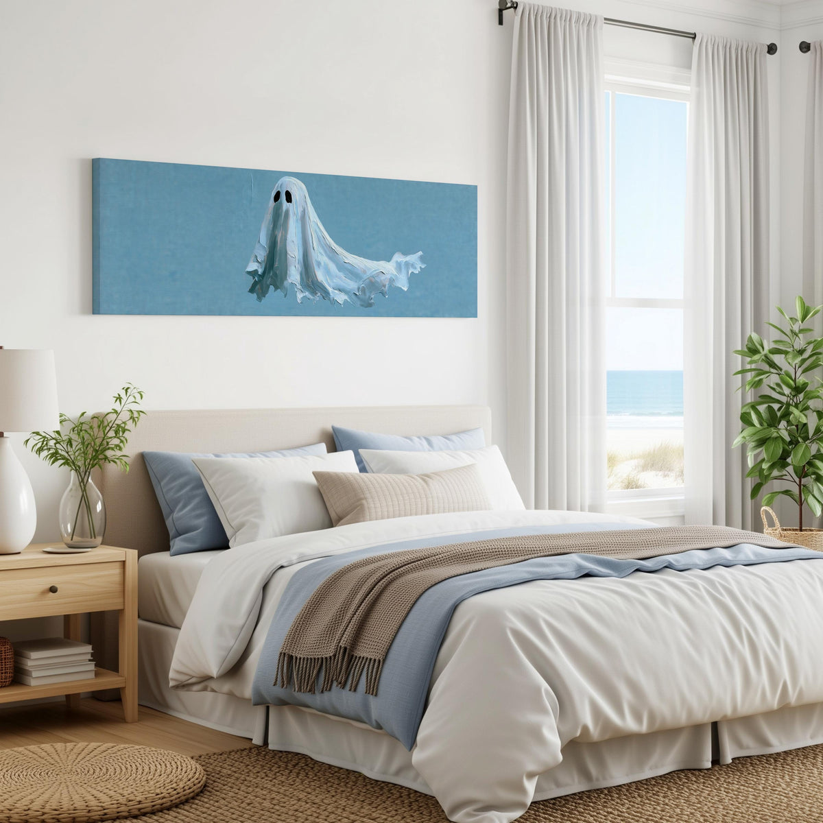 Floating ghost on blue panoramic canvas print above a bed in a coastal bedroom