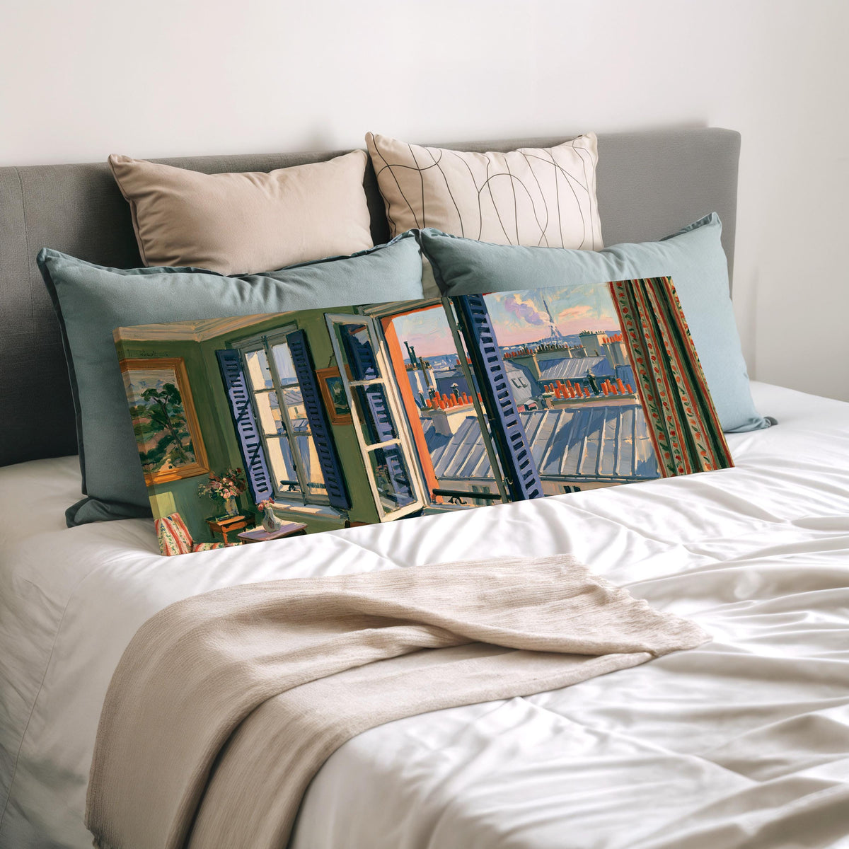 Paris chimneys and rooftops from a sunny window wide panoramic canvas print laid on a bed to show its size
