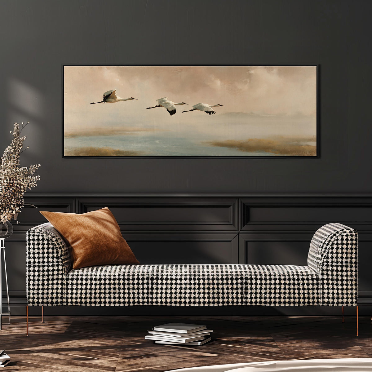 Cranes flying over a calm shore at dusk wide panoramic canvas print above a bench in a dark living room