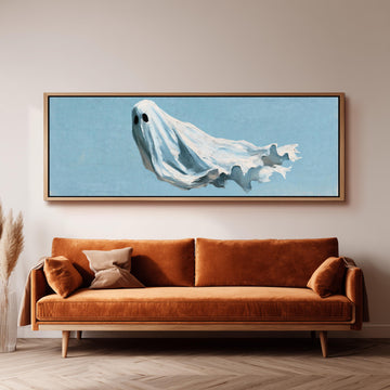 Drifting ghost spirit long horizontal canvas print above a sofa in a living room