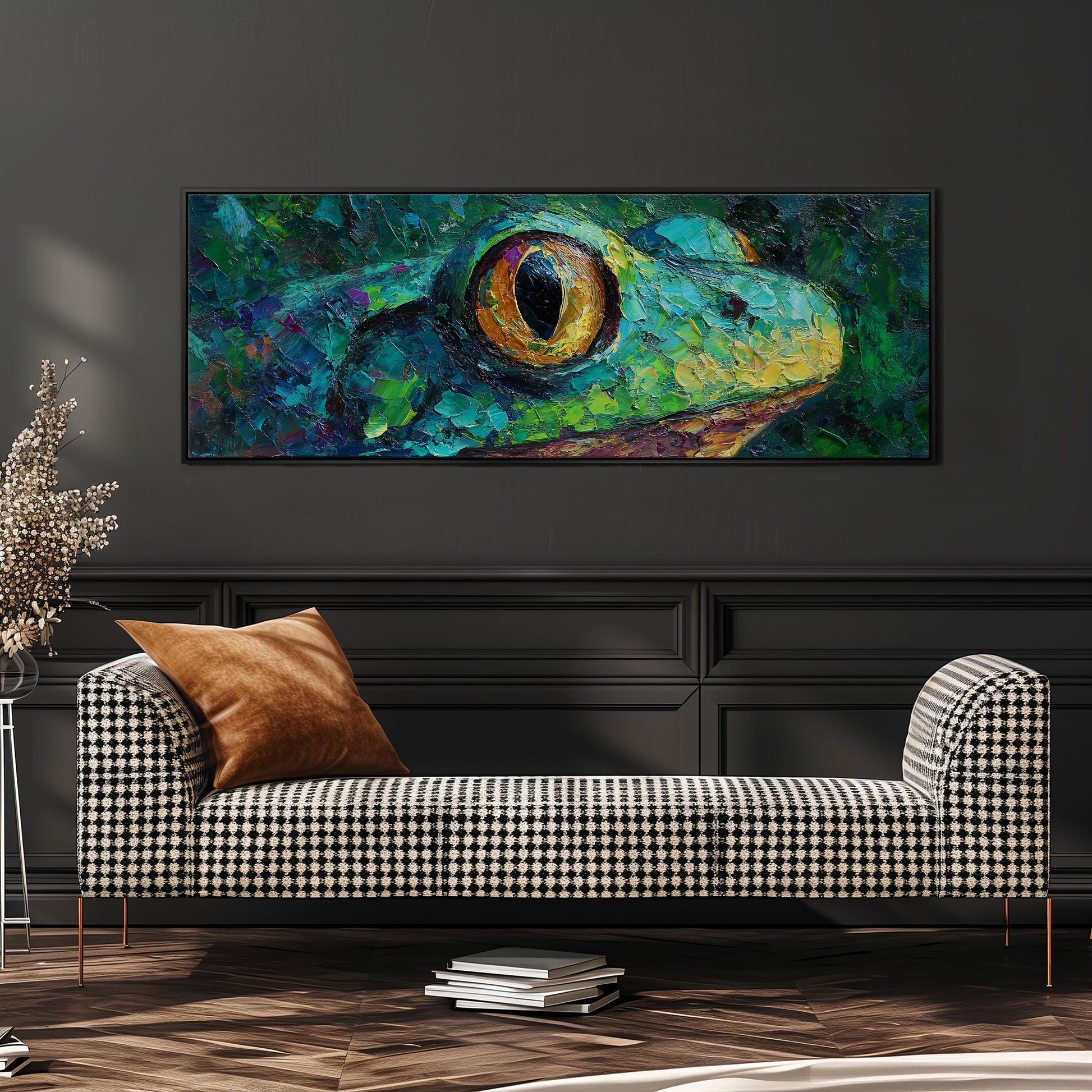 a large, colorful painting of a frog's face hanging on a wall above a black and white checkered sofa.