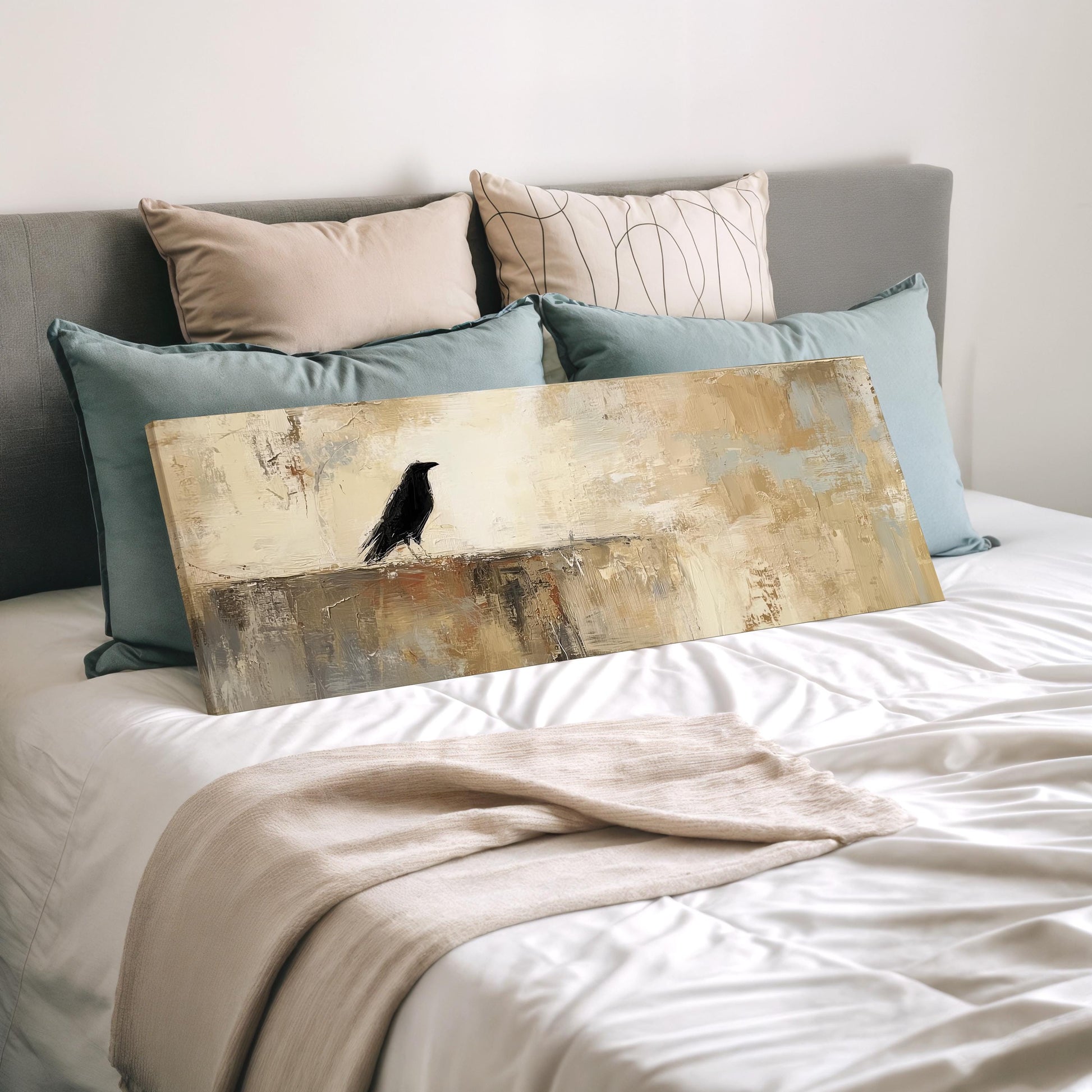 a bedroom with a bed and a painting of a bird on the bed. The bed is covered with white sheets and has several pillows on it. The painting features a black bird perched on a wall.