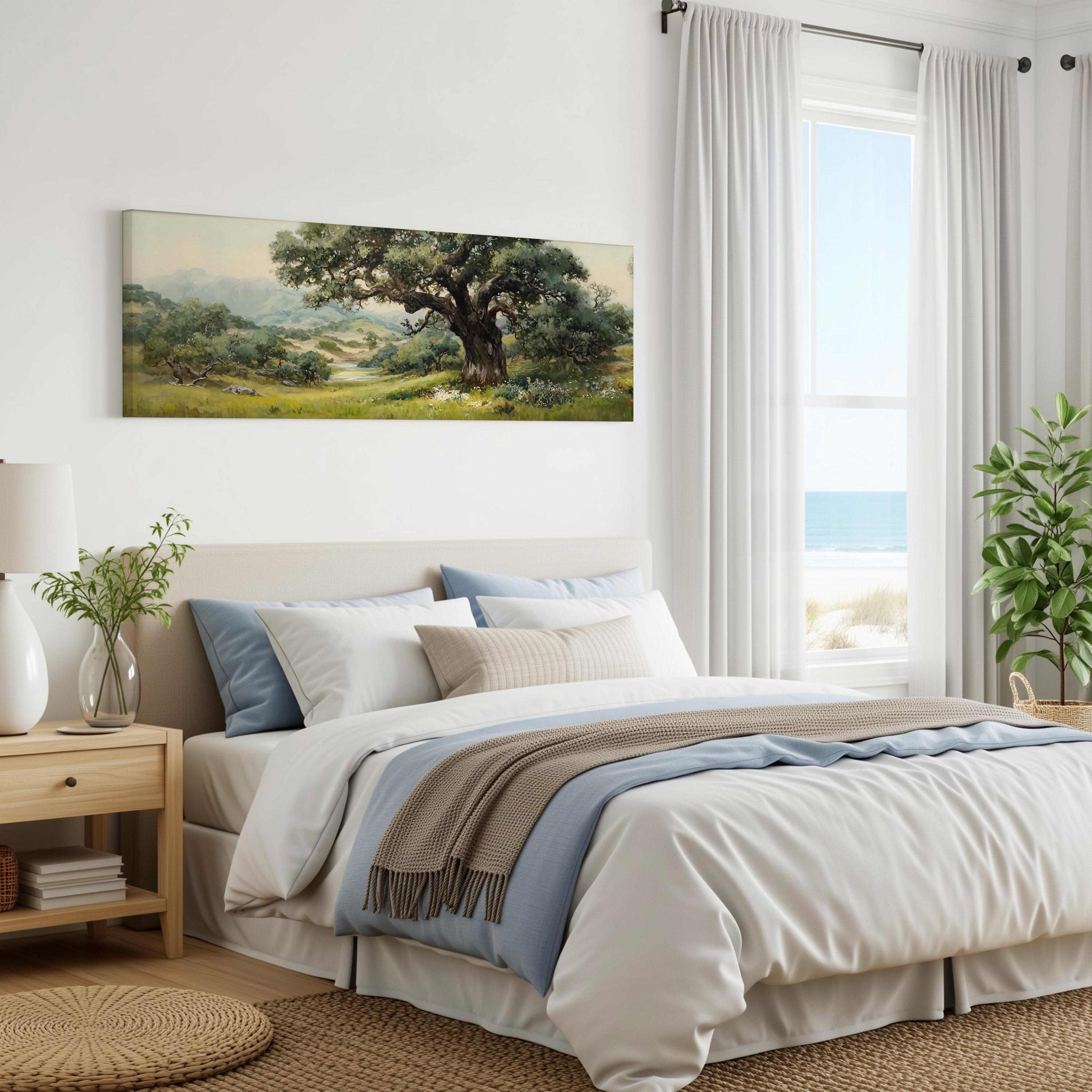 a serene bedroom with a large bed, a painting of a lush green landscape hanging on the wall, and a window overlooking the ocean.