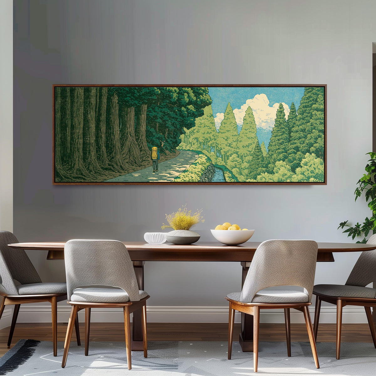 Hiker on a forest trail long horizontal canvas print above a sofa in a living room