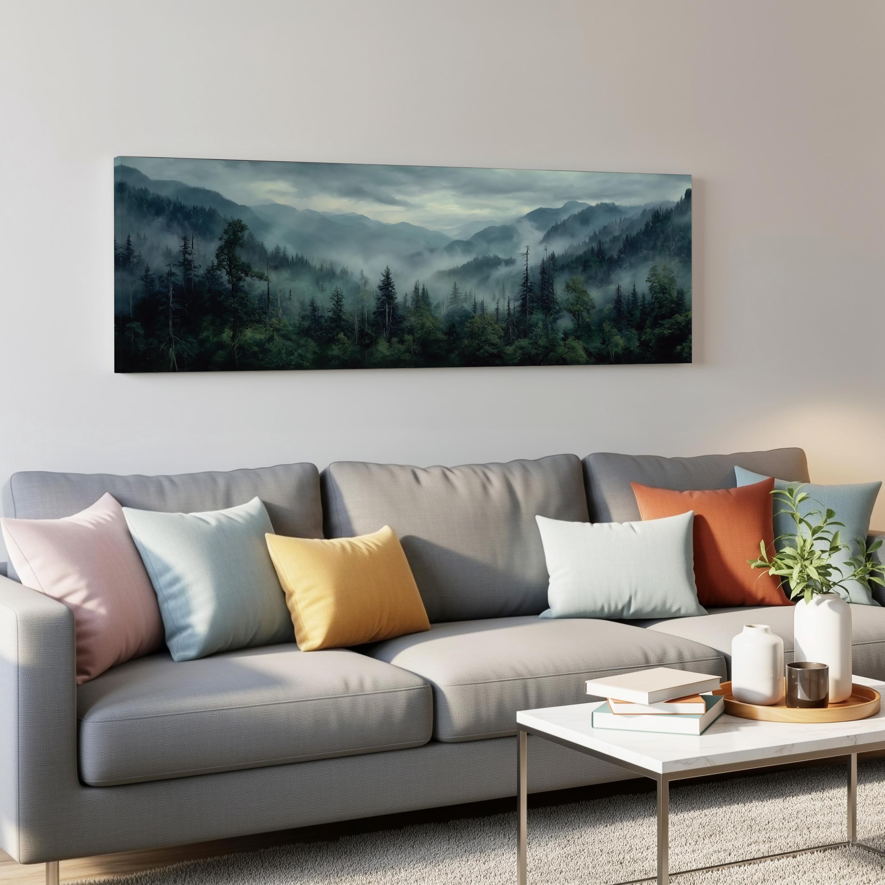 a gray couch with colorful throw pillows, a coffee table, and a large landscape painting hanging on the wall above the couch.