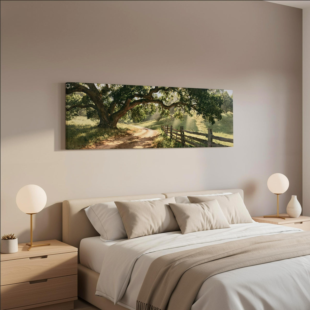 Sunlit country lane with oak trees and a wooden fence wide panoramic canvas print above a bed in a neutral bedroom