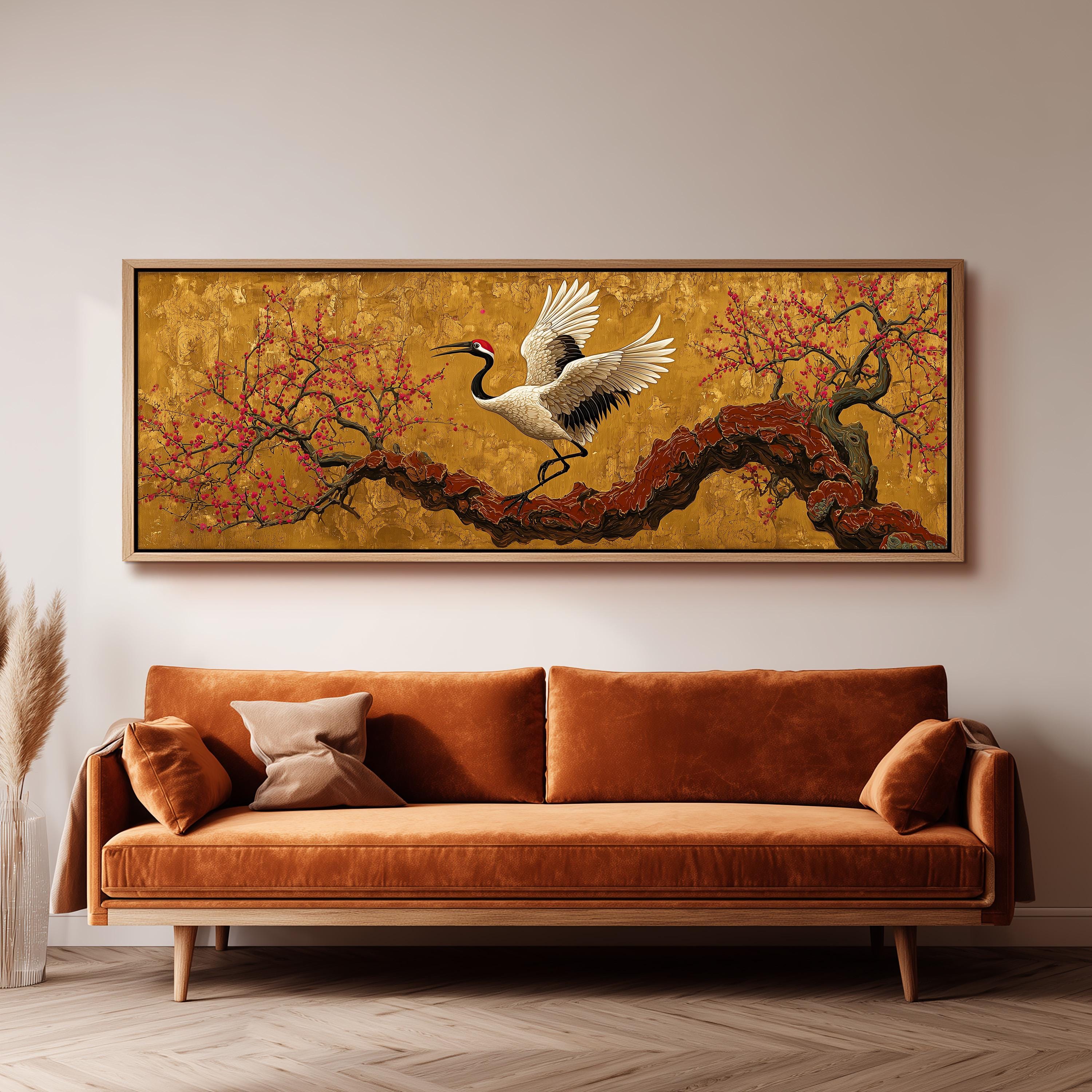 a large, framed painting of a crane in flight above a brown sofa in a living room setting.
