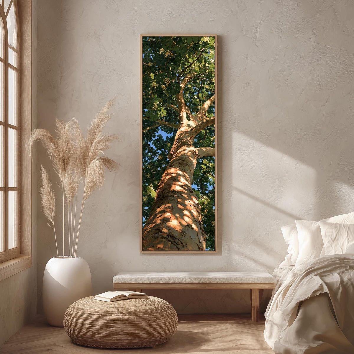 Sunlit tree trunk and summer canopy long vertical canvas print in a bright reading corner