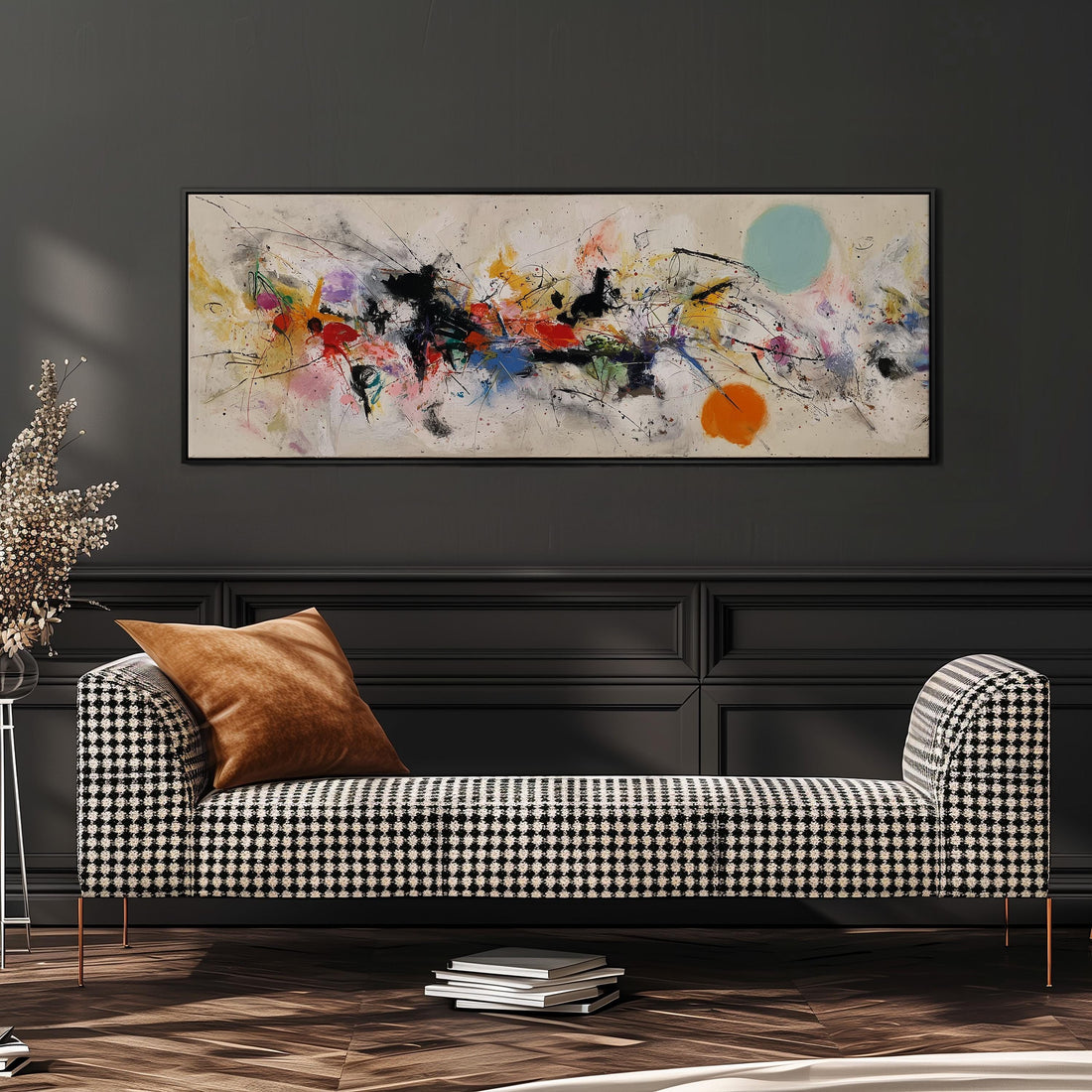 a large abstract painting hanging on a wall above a brown sofa with two pillows.