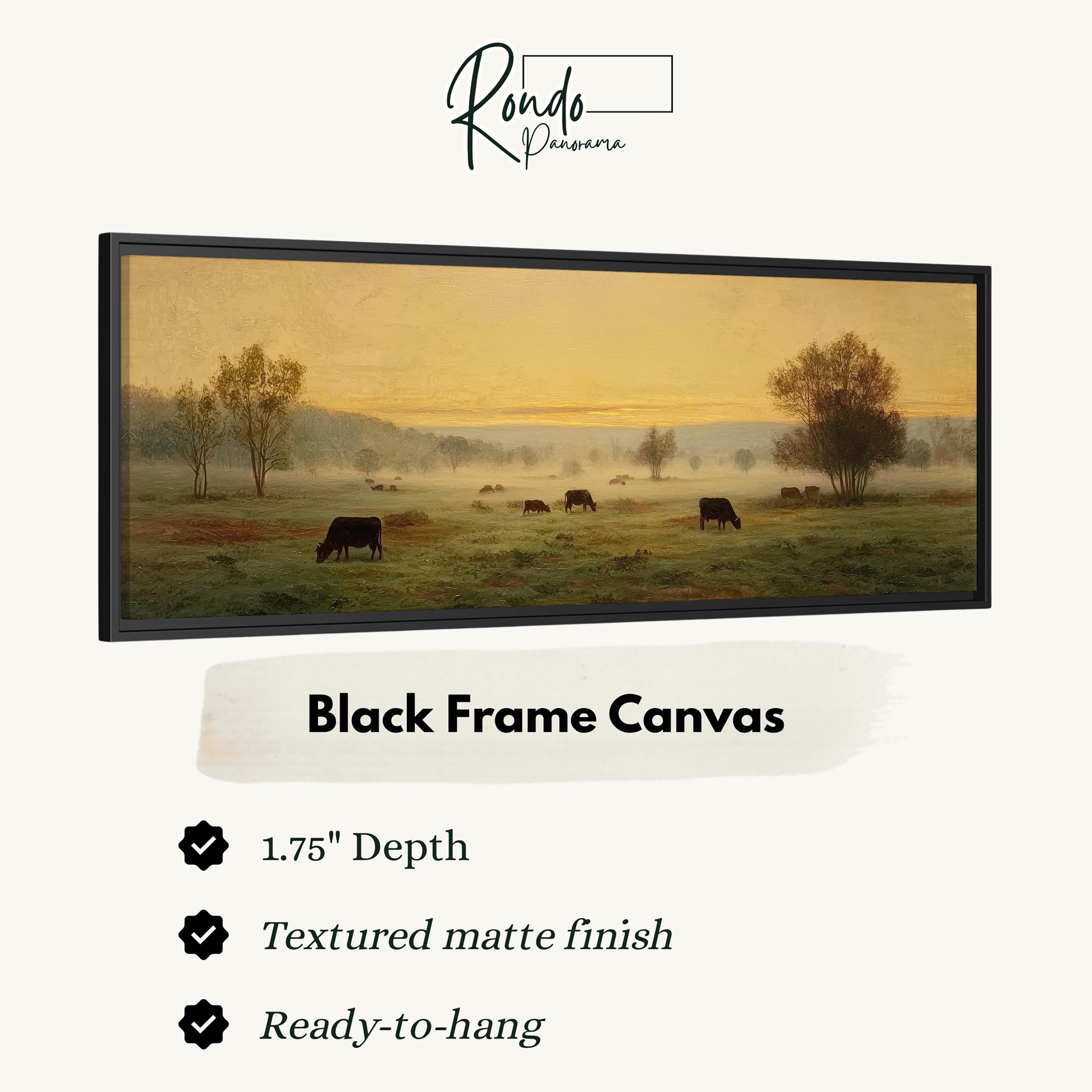 The image is a black frame canvas depicting a pastoral scene with cows grazing in a field.