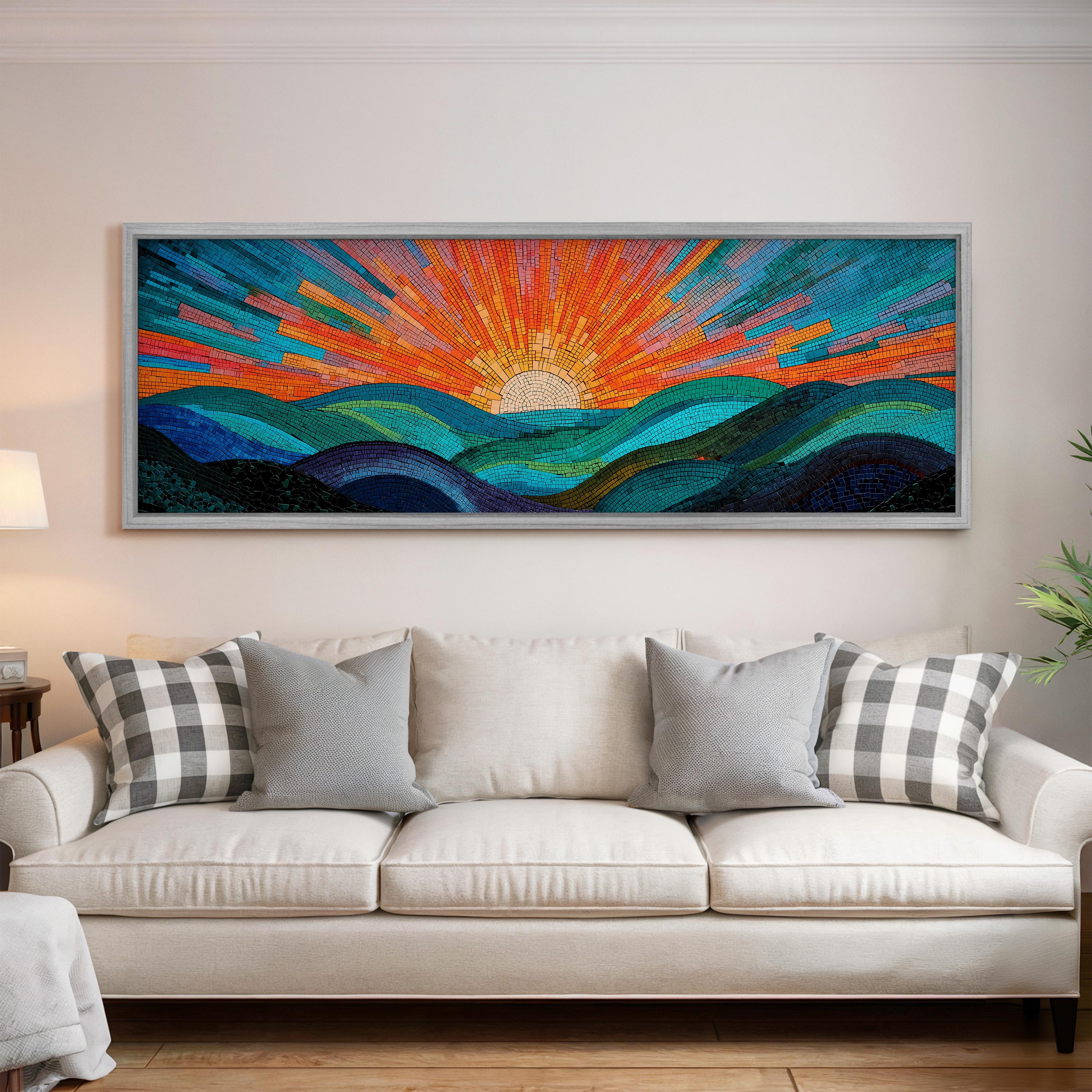 a large, colorful mosaic artwork hanging on a wall above a white couch with gray and white plaid throw pillows.