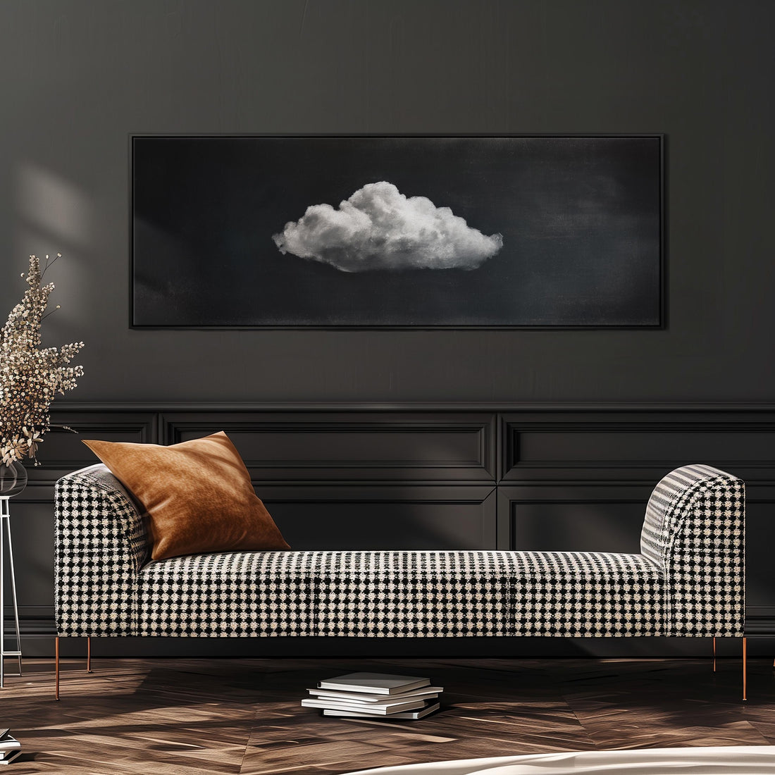 a black and white checkered sofa with a brown throw pillow, set against a dark wall with a framed image of a cloud above it.