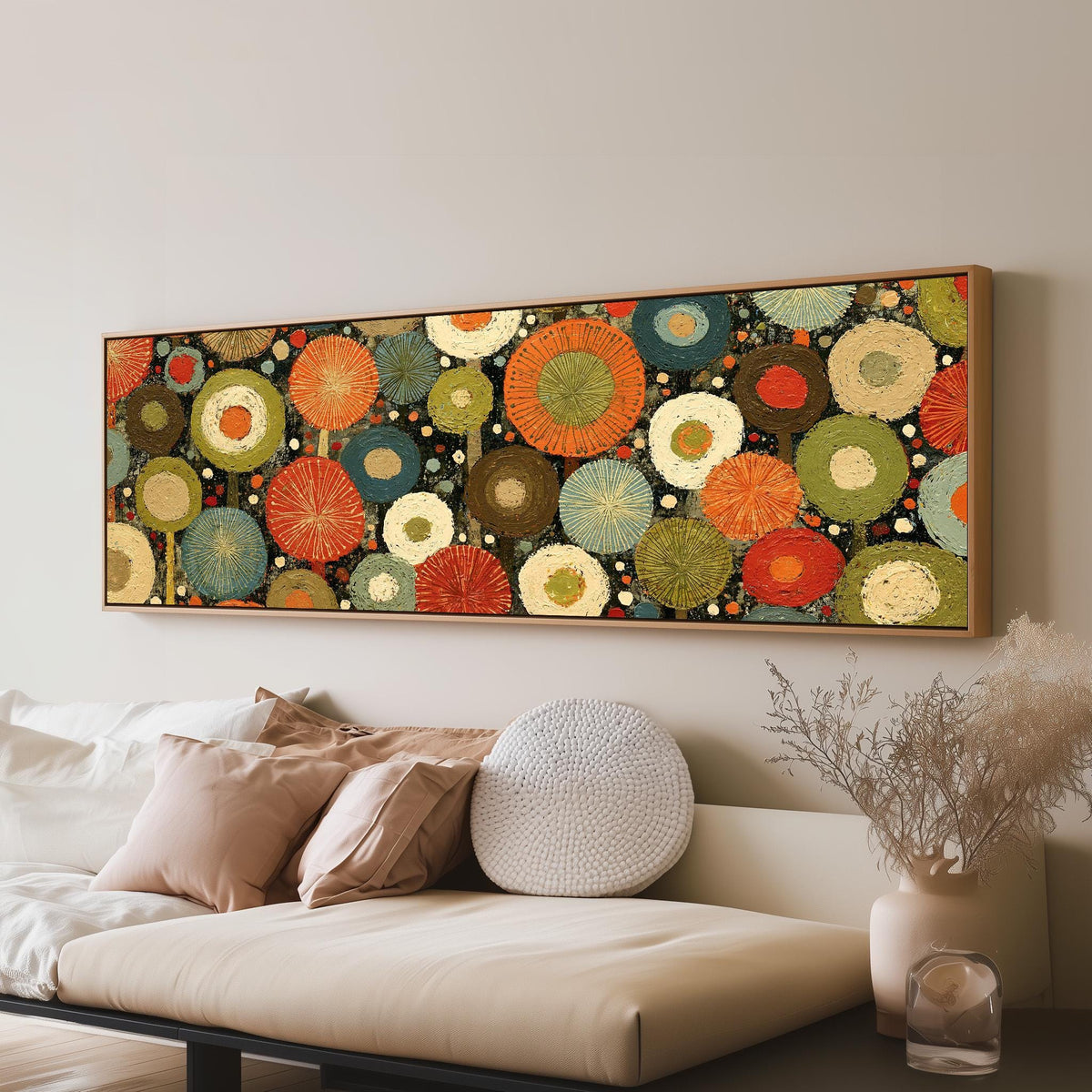 Layered circle dot pattern long horizontal canvas print above a sofa in a living room