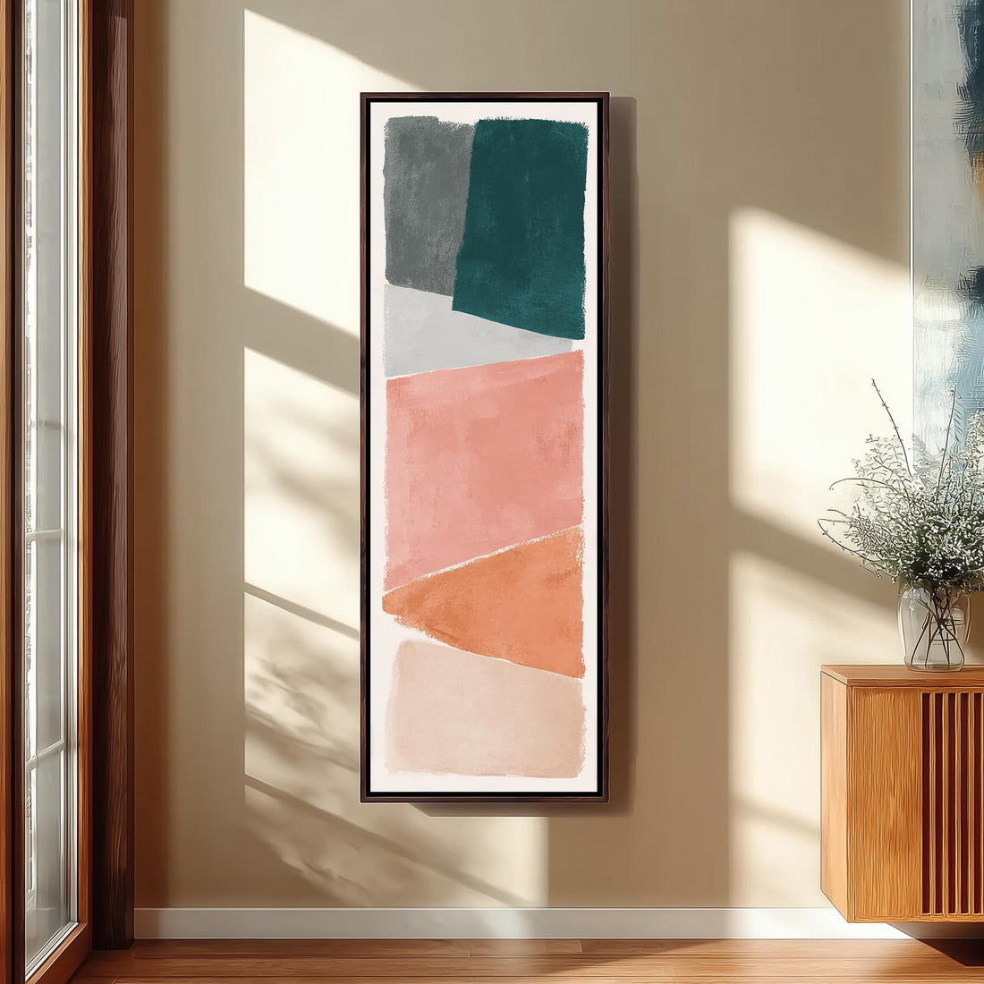a modern living room with a large abstract painting hanging on the wall, a wooden chair, a small table, and a window with a plant on the sill.