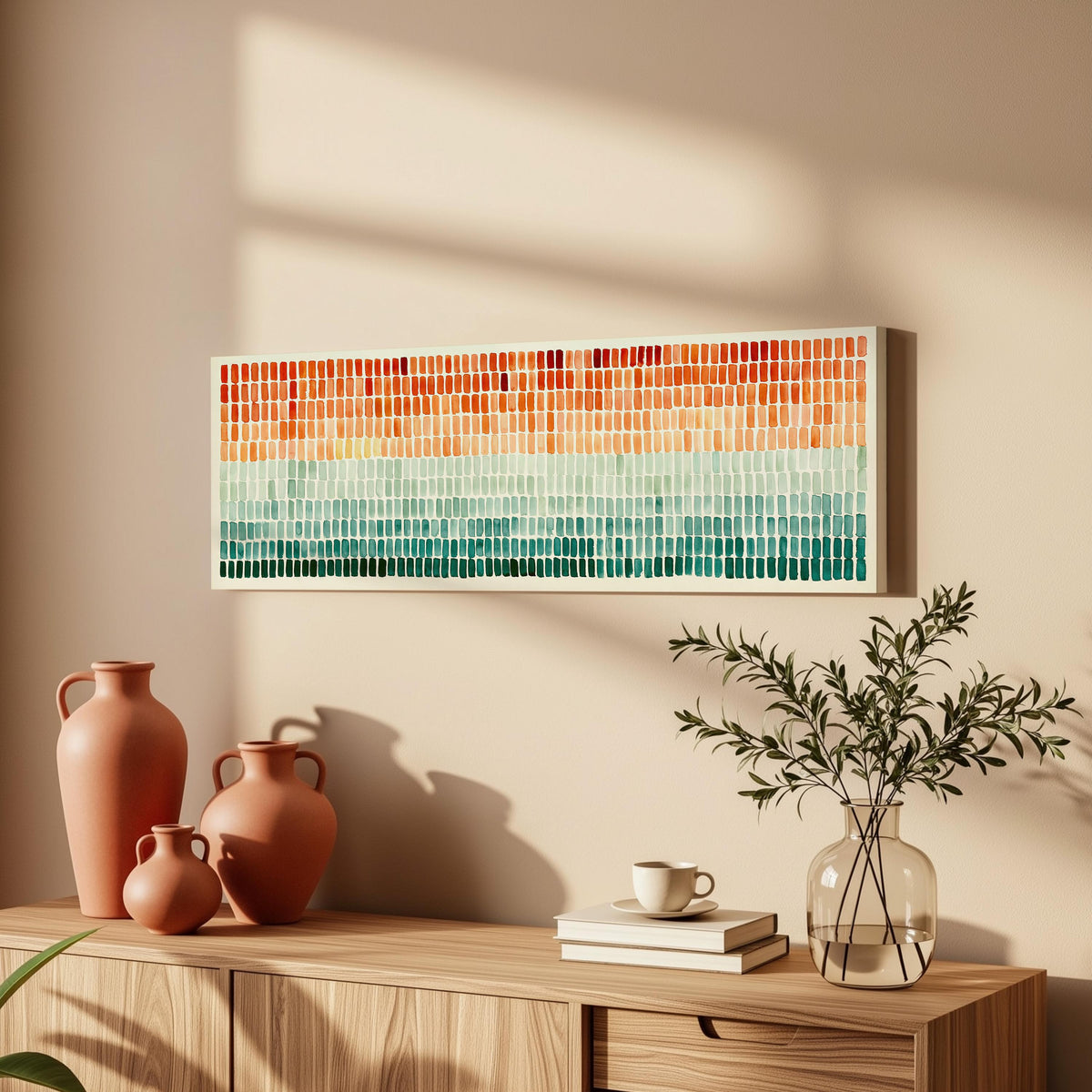 Brushmarks fading from orange to teal long horizontal canvas print above a wooden sideboard