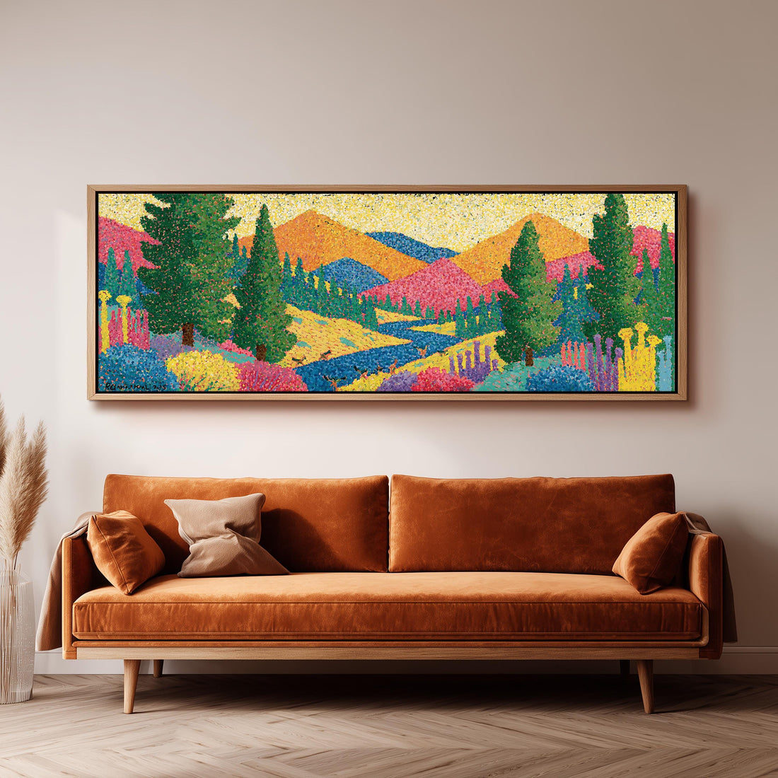 Colorful pine mountain valley long horizontal canvas print above a sofa in a living room