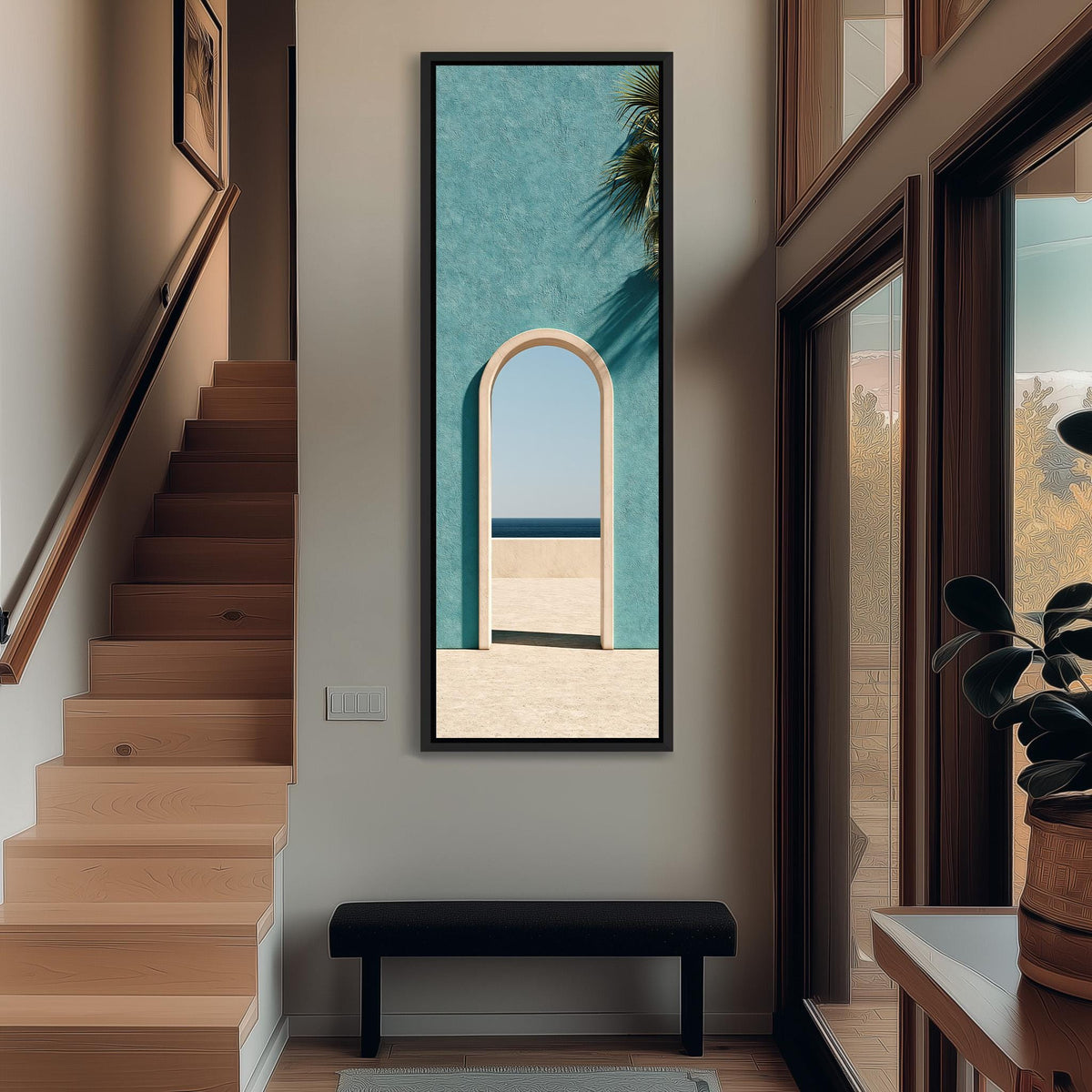 Arched doorway in a teal wall opening to the sea tall narrow canvas print beside a staircase in an entryway