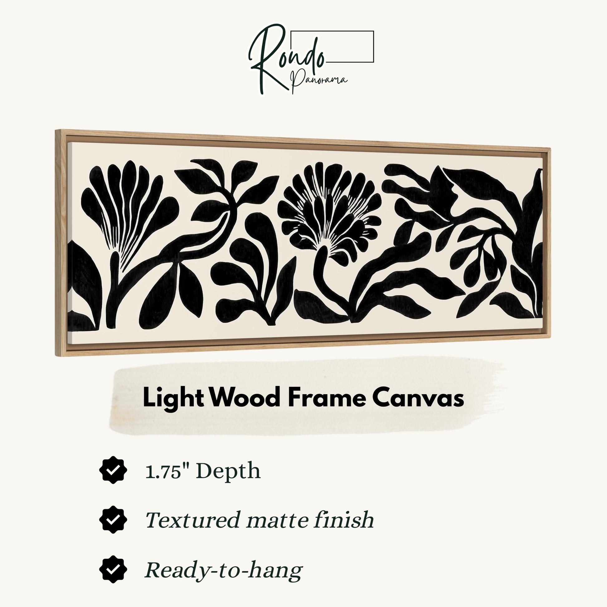 a light wood frame canvas with a floral design in black and white.